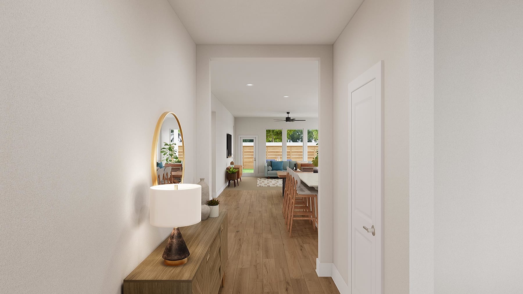 A bright, minimalist hallway with wooden flooring leads to a cozy living space, featuring a mirror and decorative elements along the walls.
