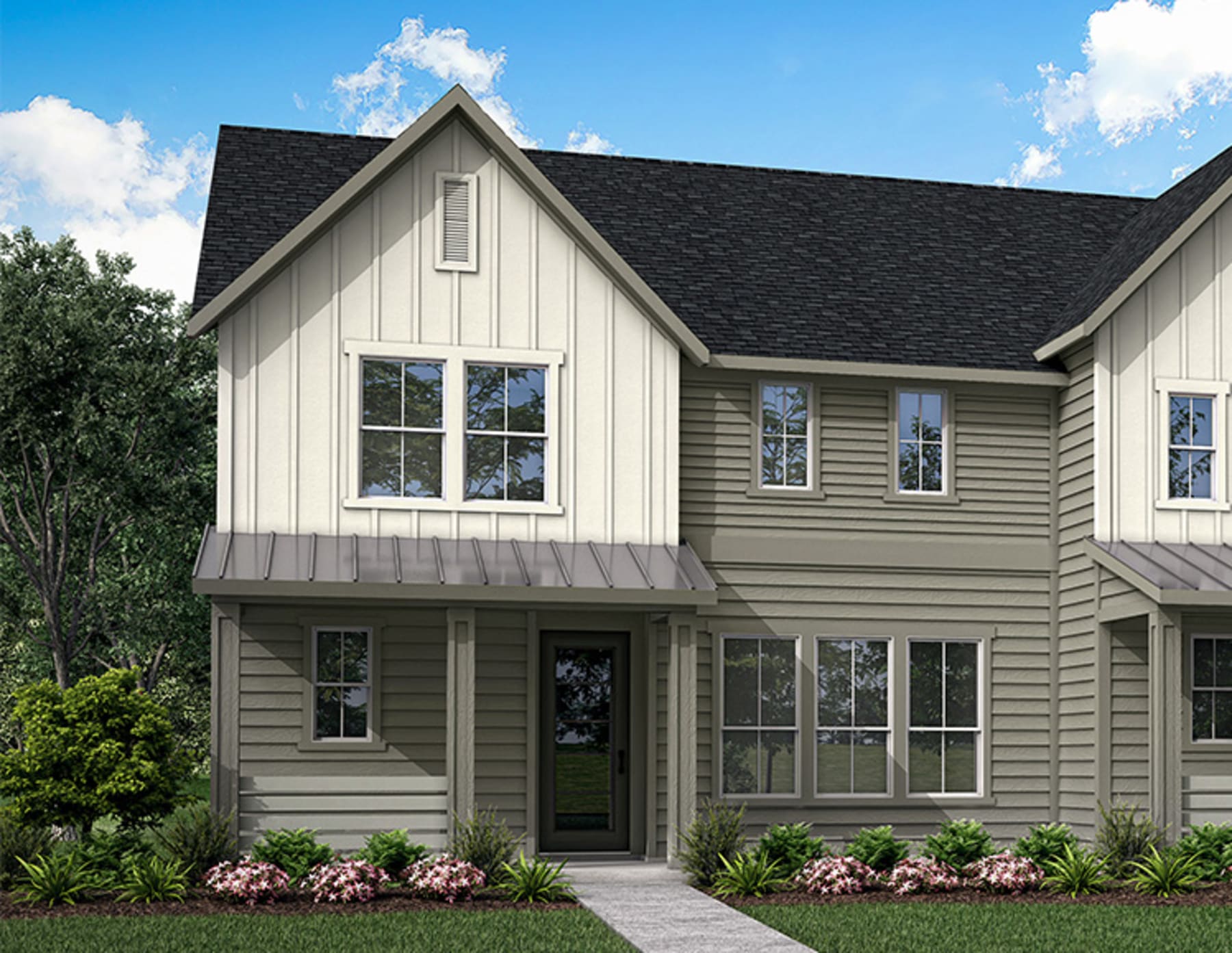 A two-story house with a gable roof, siding in a neutral color, and a landscaped front yard with shrubs and trees in the background.