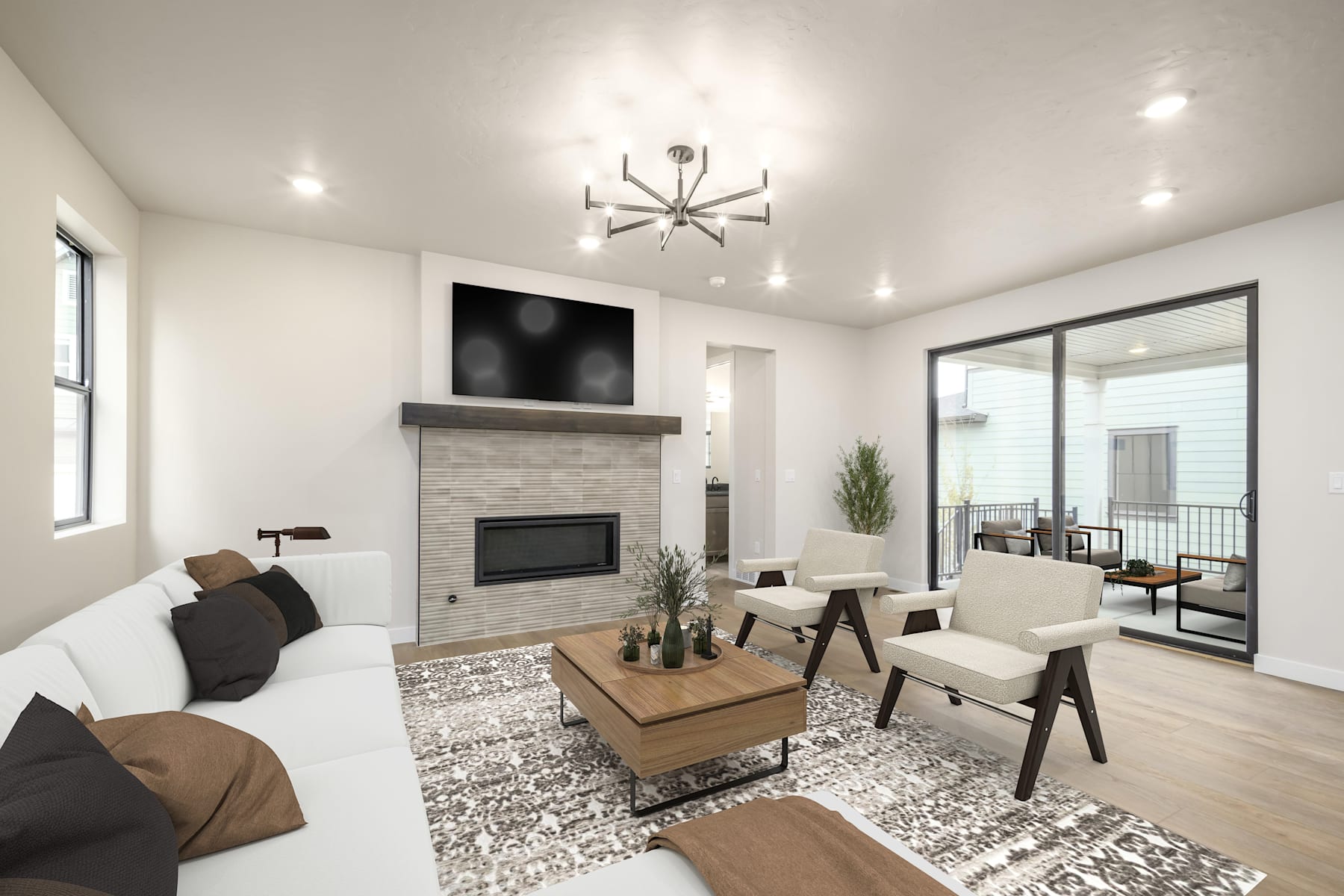 A modern and stylish living room with a fireplace, a large TV, and a mix of contemporary and rustic furniture, including a wooden coffee table and comfortable armchairs.