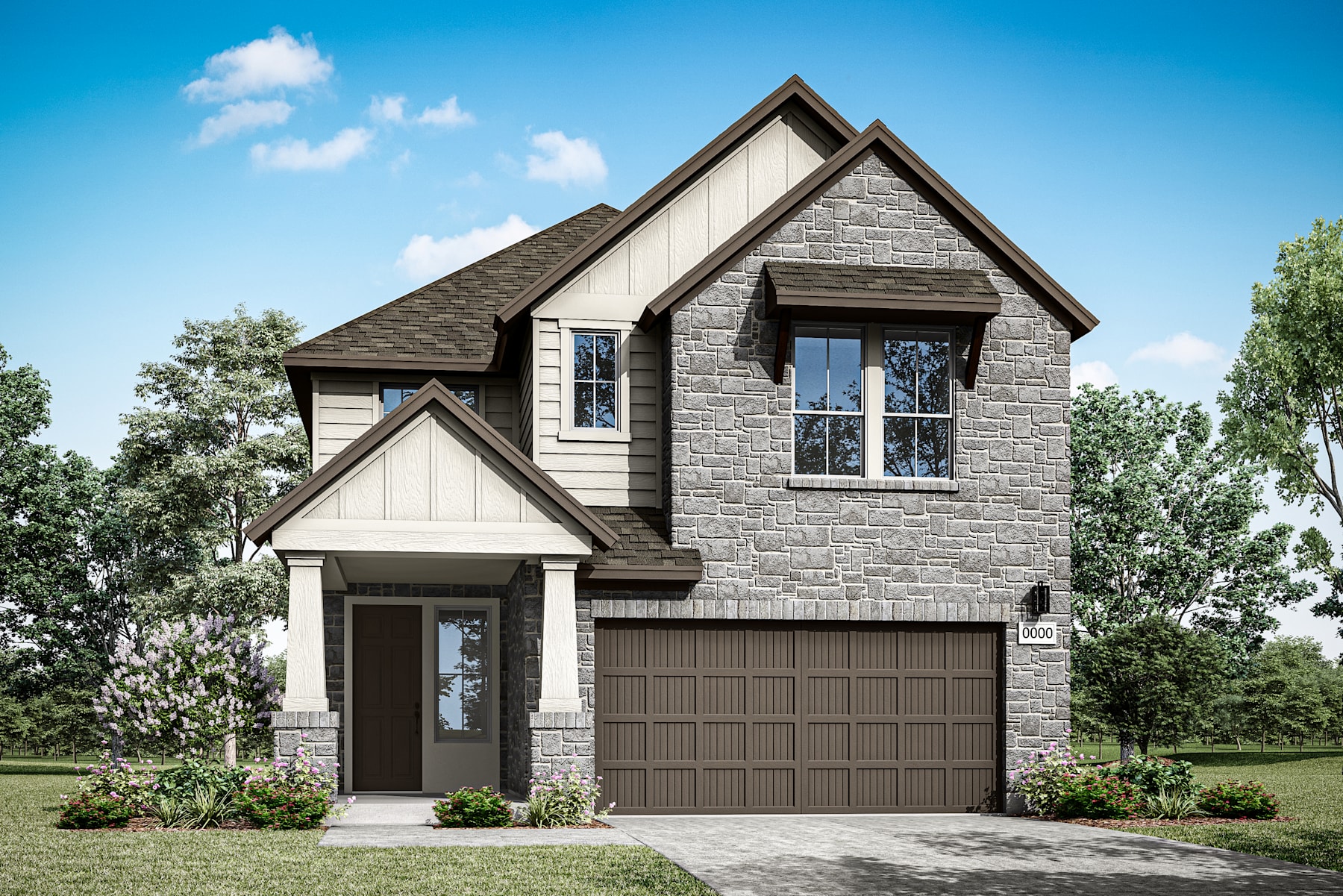A two-story house with a stone exterior, a gabled roof, and a garage door in the foreground, surrounded by lush greenery and a clear blue sky in the background.