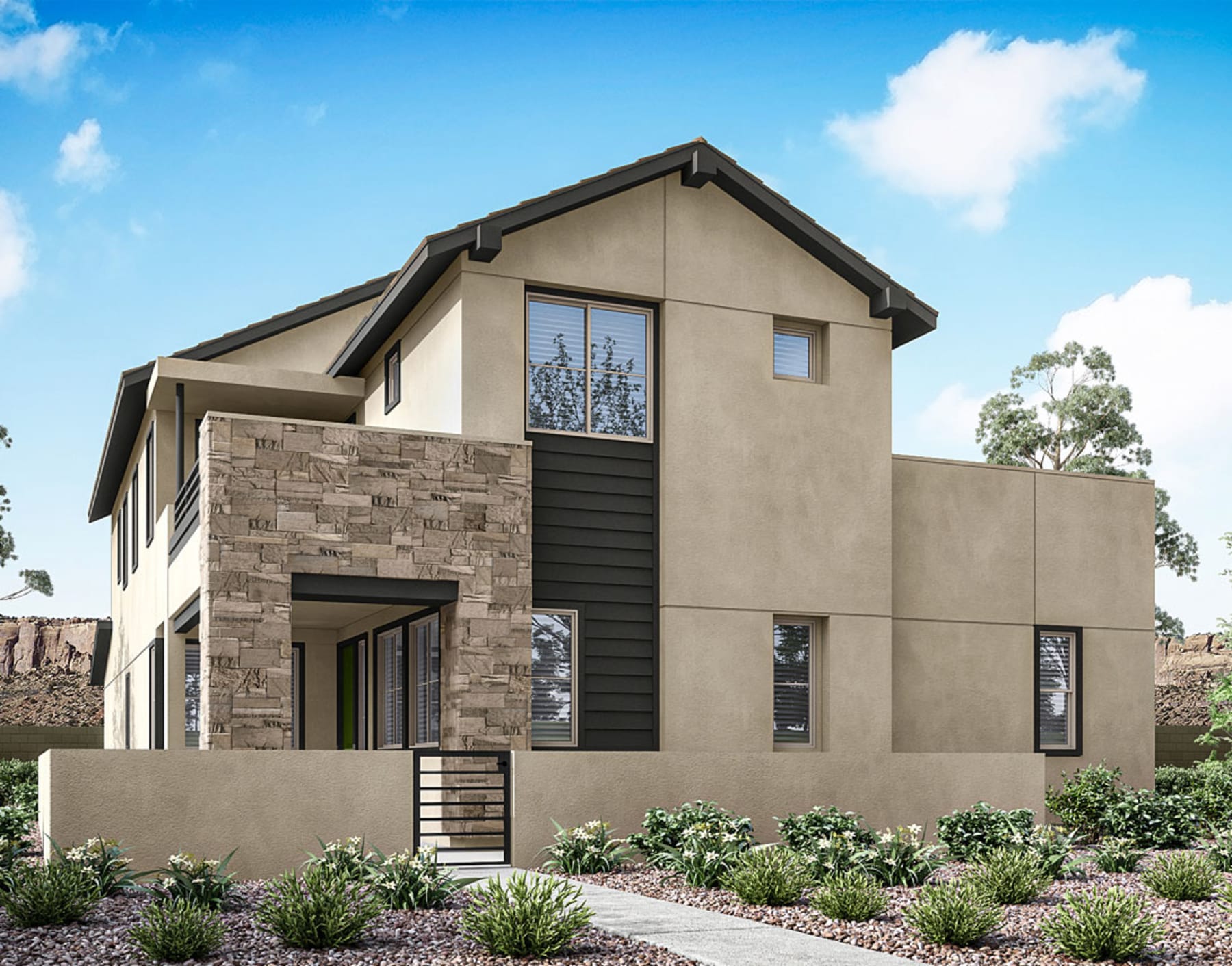 A modern two-story house with a stone facade, surrounded by lush landscaping and set against a clear blue sky with fluffy white clouds.