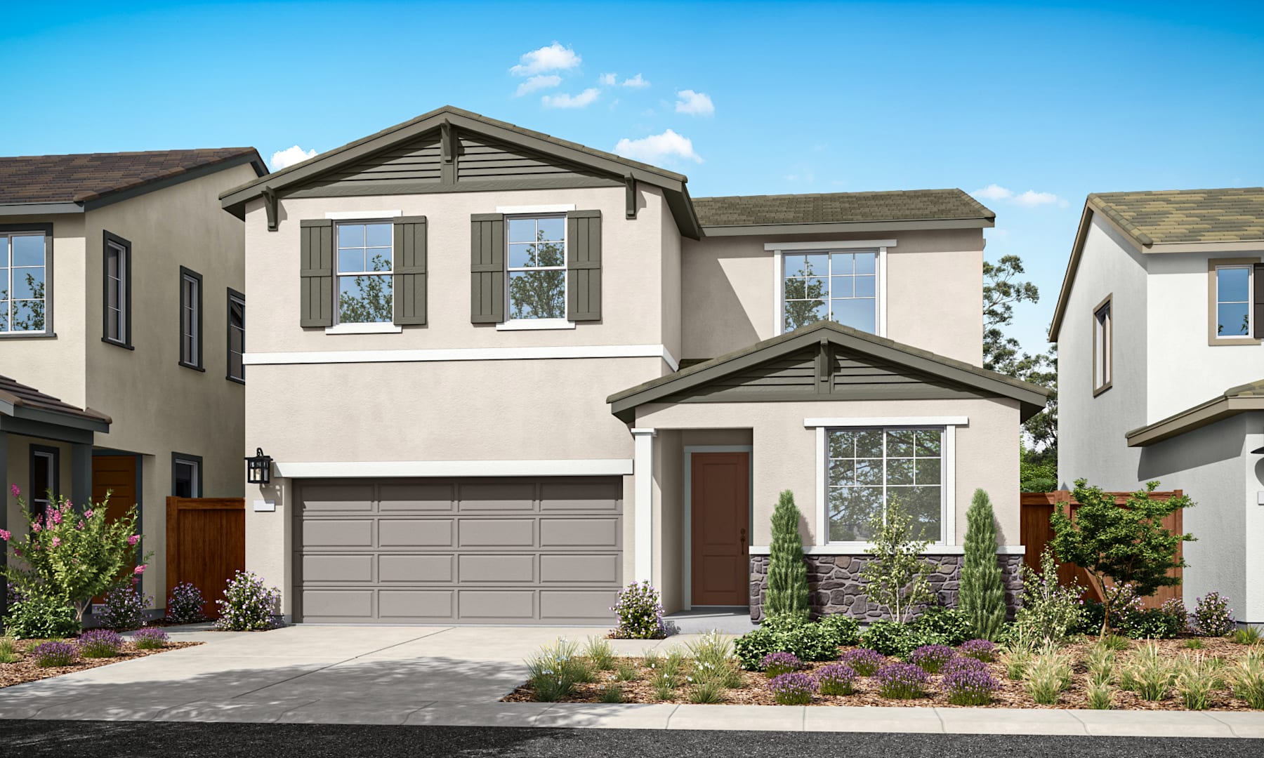 A two-story residential house with a garage, surrounded by landscaped gardens and a clear blue sky in the background.