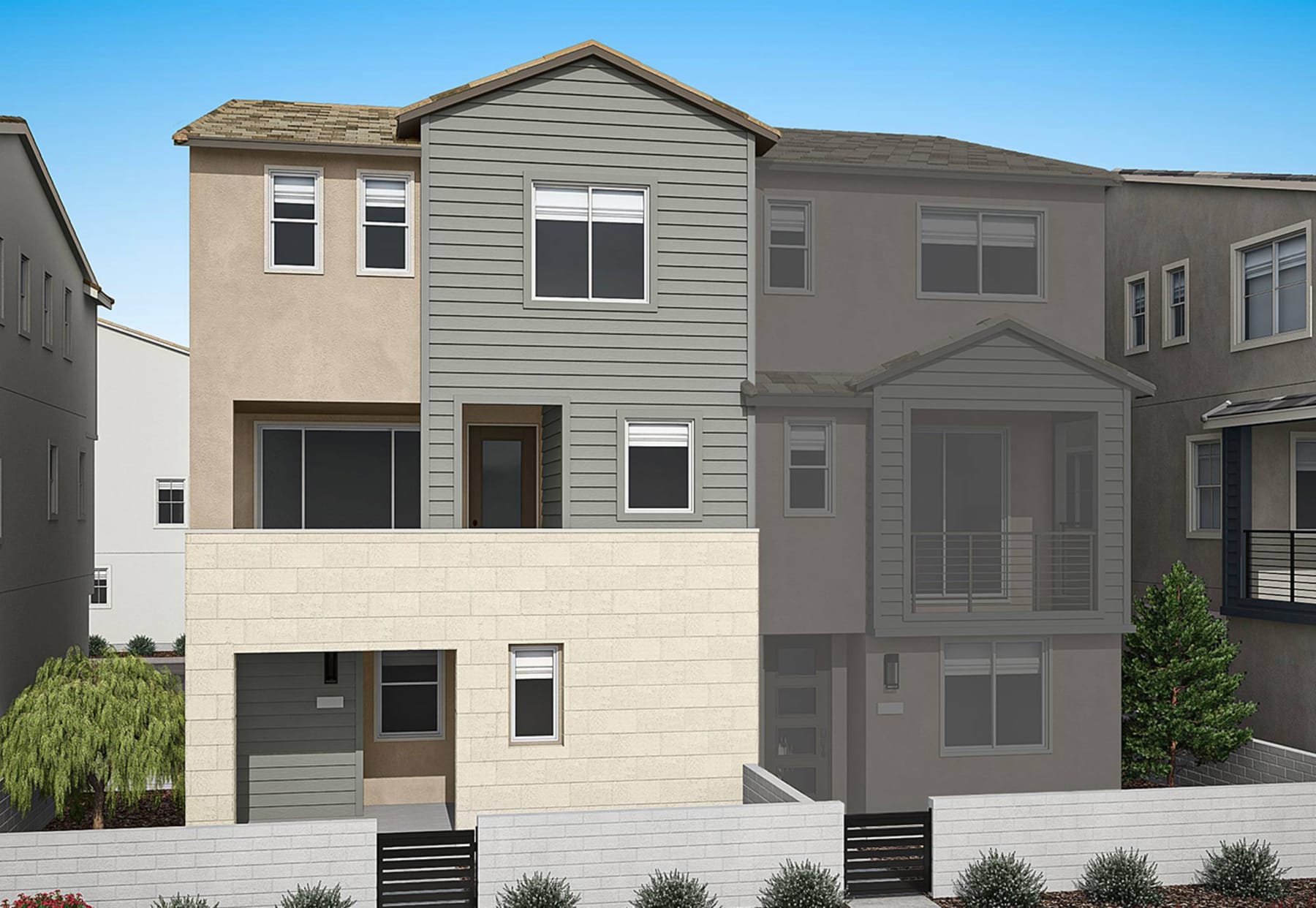 A multi-story residential building with a gray exterior and a sloped roof, surrounded by greenery and set against a clear blue sky.