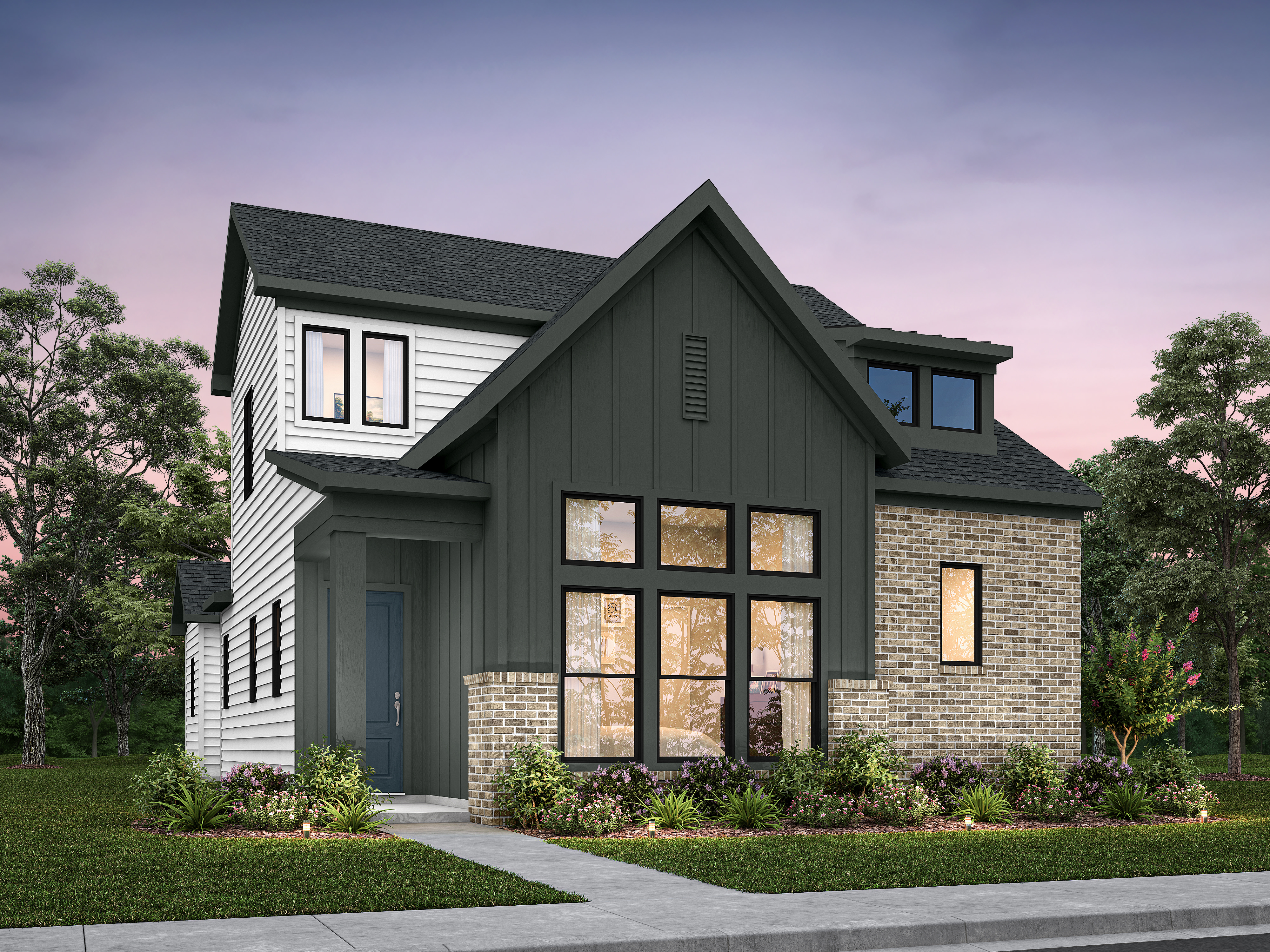 A modern two-story house with a mix of white siding and dark gray paneling stands on a manicured lawn with a sidewalk in front, while trees and a twilight sky form the background.