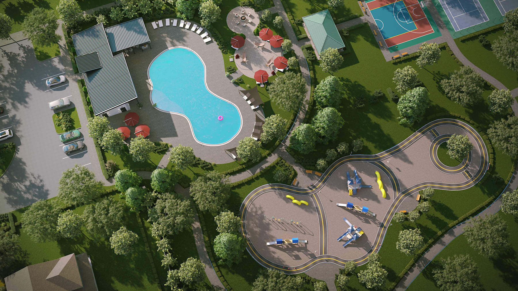 An aerial view of a resort-like setting with a large swimming pool surrounded by lush greenery, including a tennis court and other recreational facilities.