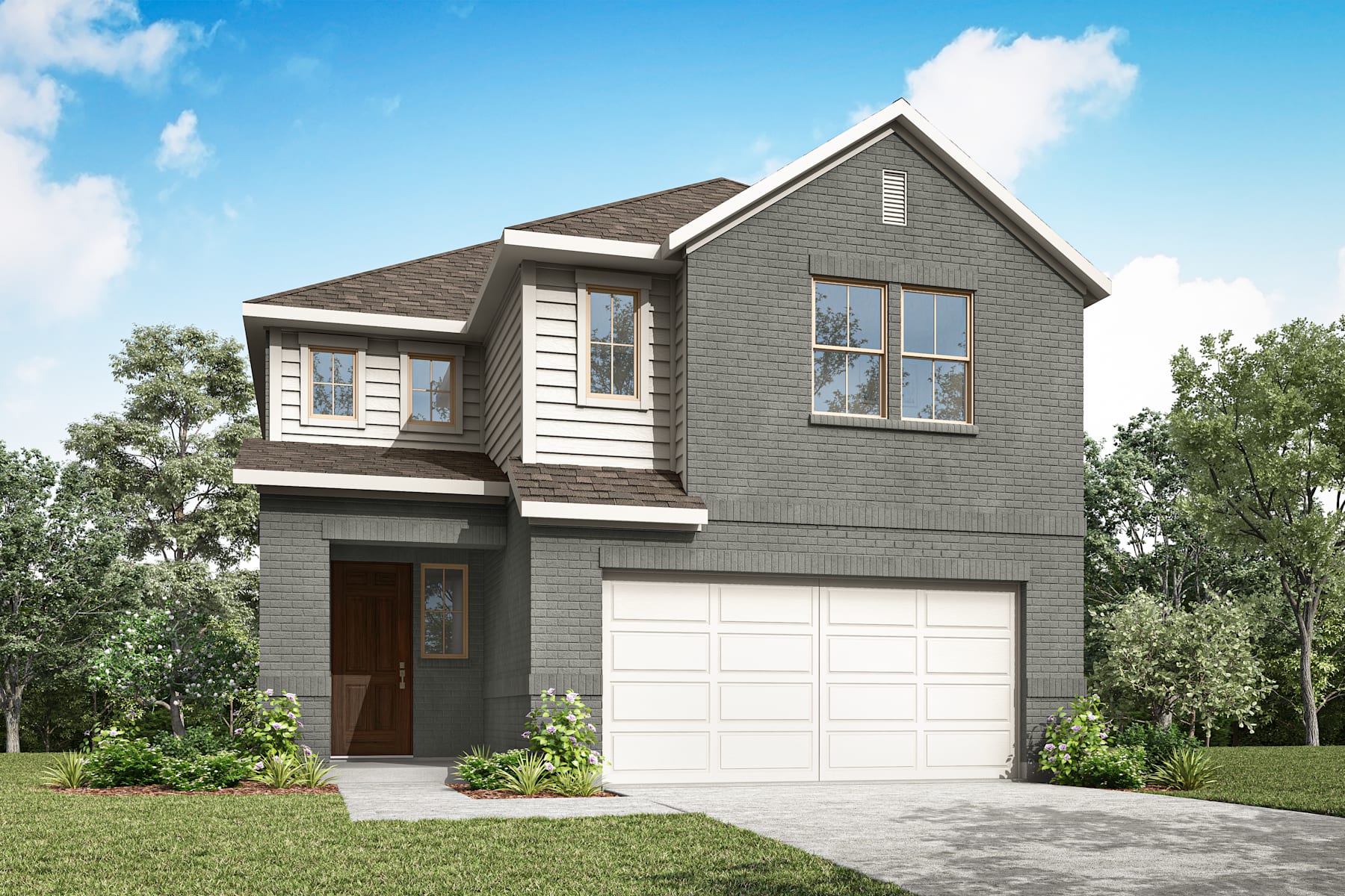 A two-story gray house with a garage stands in a grassy area surrounded by trees against a blue sky with white clouds.