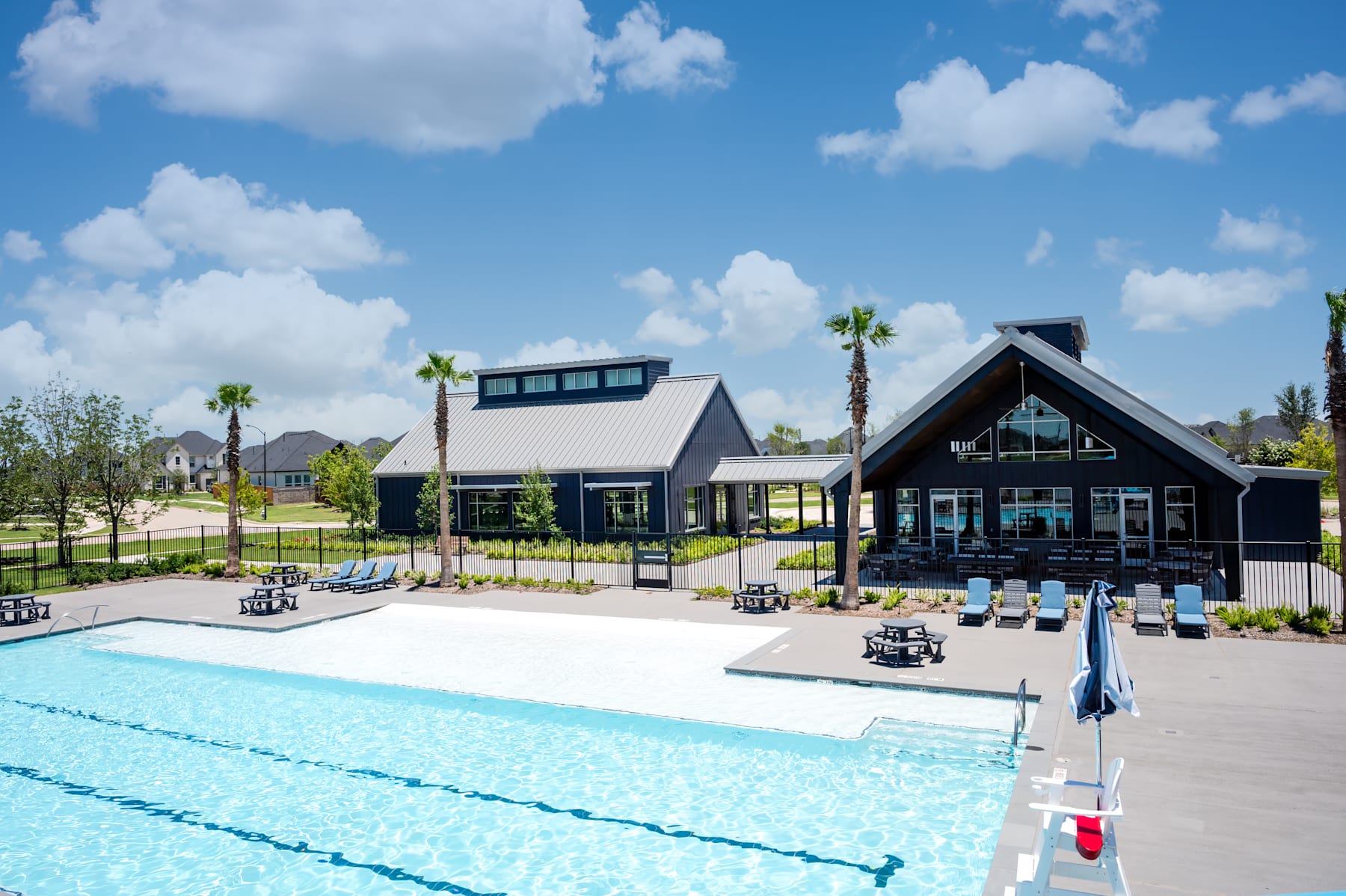 Find comfort in thoughtfully crafted homes, inviting streetscapes, and natural surroundings that encourage relaxation and connection.