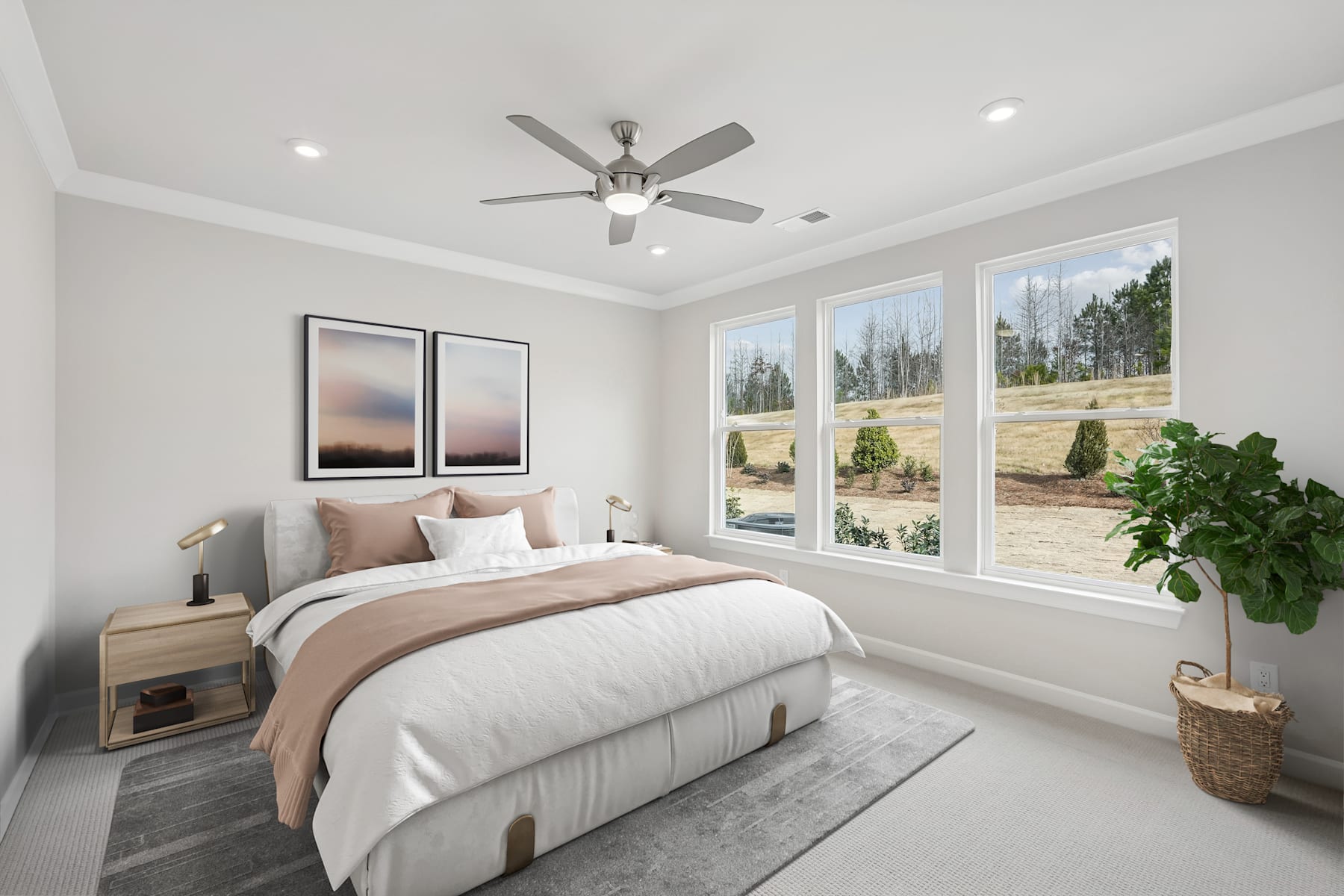 A cozy and well-lit bedroom with a large window overlooking a scenic outdoor landscape, featuring a comfortable bed, neutral-toned decor, and a ceiling fan.