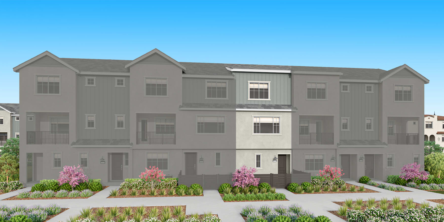 The image depicts a multi-story residential building with a gray exterior, surrounded by landscaped gardens and a clear blue sky in the background.