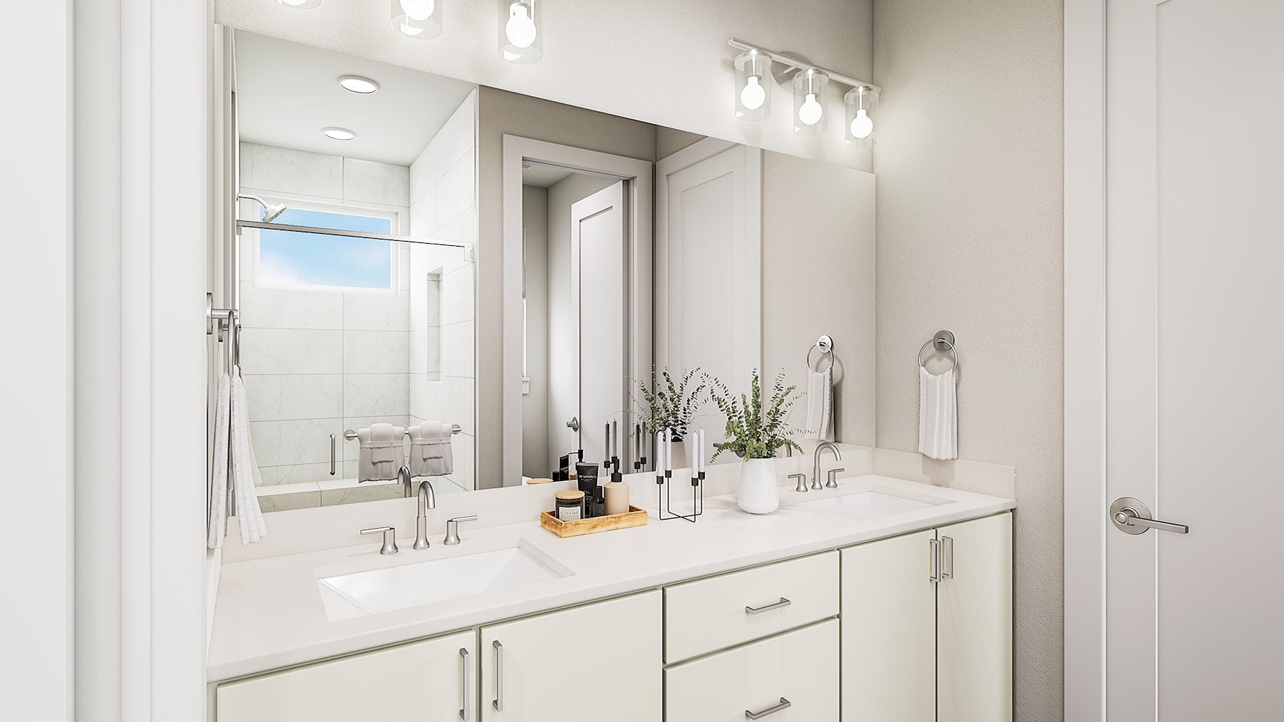 A modern, well-lit bathroom with a vanity, mirror, and various decorative elements, including plants and bottles, creating a clean and organized aesthetic.