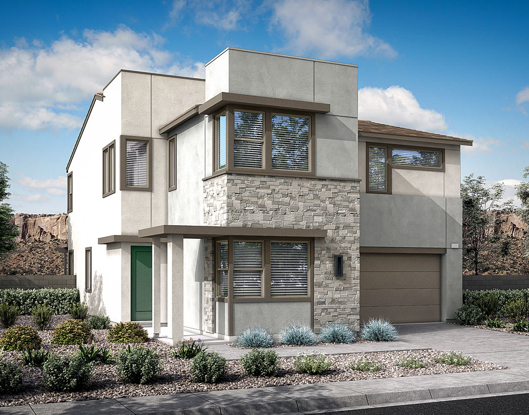 A modern, two-story residential building with a mix of stone and stucco exterior, featuring a garage, large windows, and a landscaped front yard against a backdrop of a clear blue sky with some clouds.