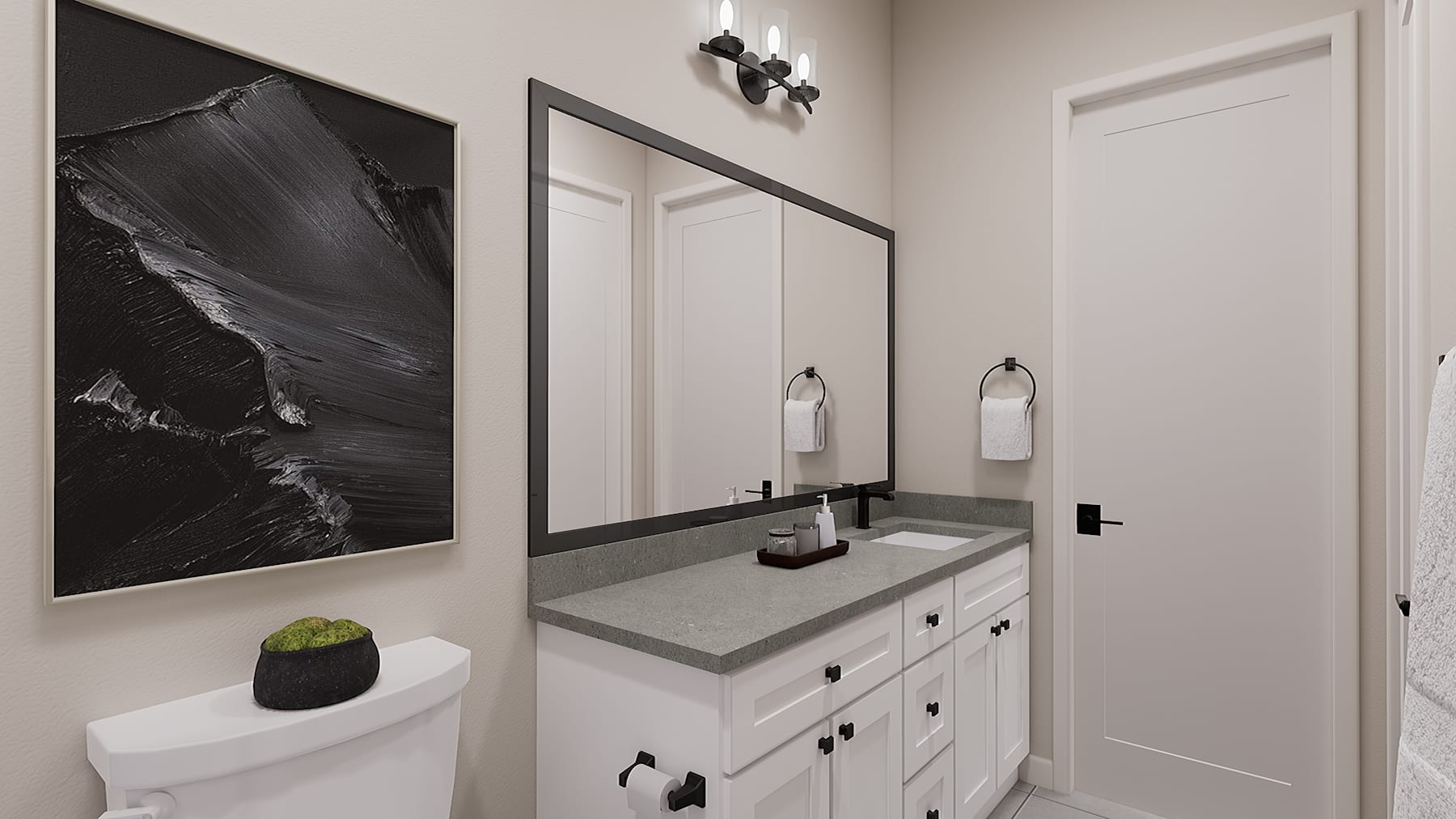 A modern and minimalist bathroom with a large framed artwork, a vanity with drawers, and a toilet in the foreground.