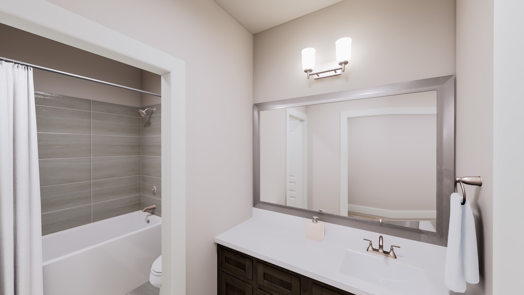 A modern bathroom with a white vanity, a large mirror, and a tiled shower enclosure in the background.