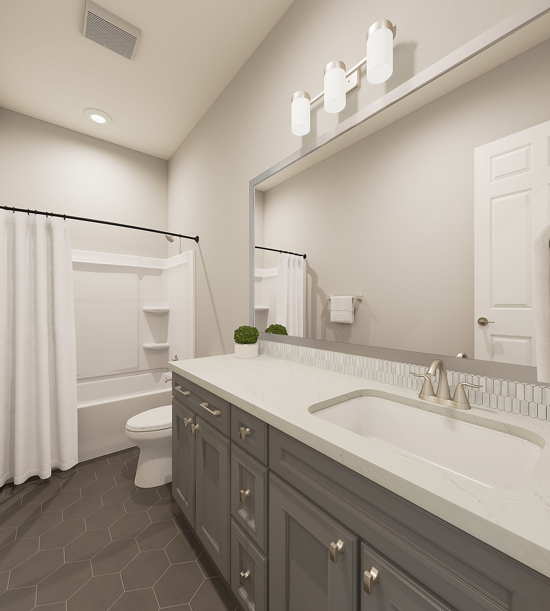 A modern and well-designed bathroom with a large vanity, a white countertop, and a tiled floor. The room is illuminated by overhead lighting fixtures, creating a bright and inviting atmosphere.
