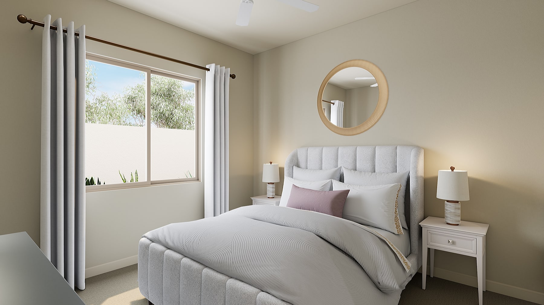 A cozy and well-furnished bedroom with a large window, a plush white bed, and a round mirror on the wall.