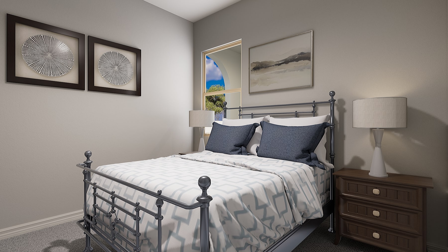A cozy and well-decorated bedroom with a metal bed frame, patterned bedding, and framed artwork on the walls, complemented by a window providing natural light and a scenic view.