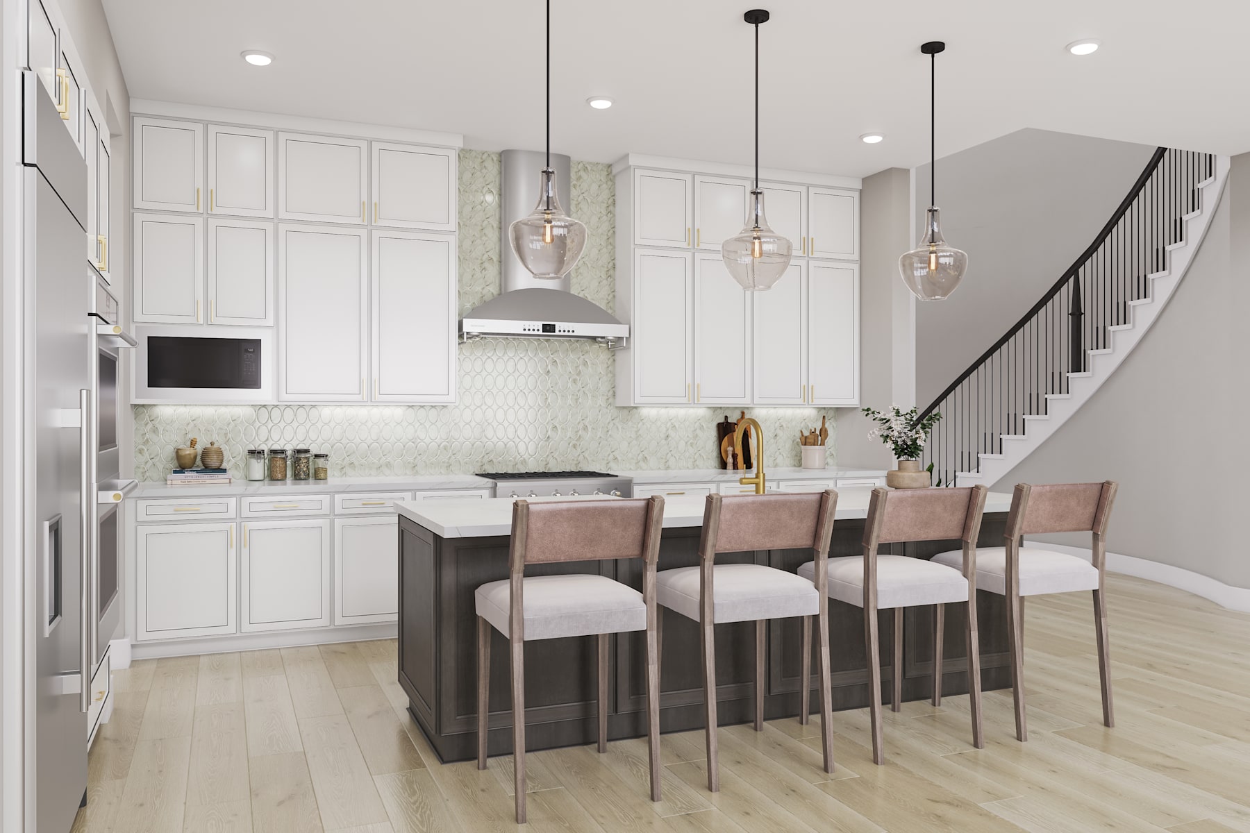 A modern, open-concept kitchen with white cabinetry, pendant lighting, and a central island with bar stools, set against a backdrop of a staircase and hardwood flooring.