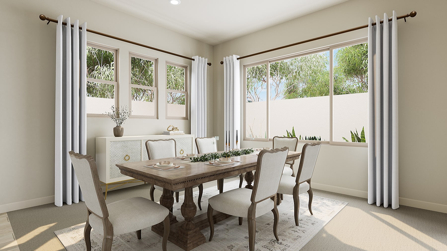 A cozy and bright dining room with a rustic wooden table surrounded by upholstered chairs, large windows overlooking a lush outdoor landscape, and potted plants adding a touch of greenery to the space.
