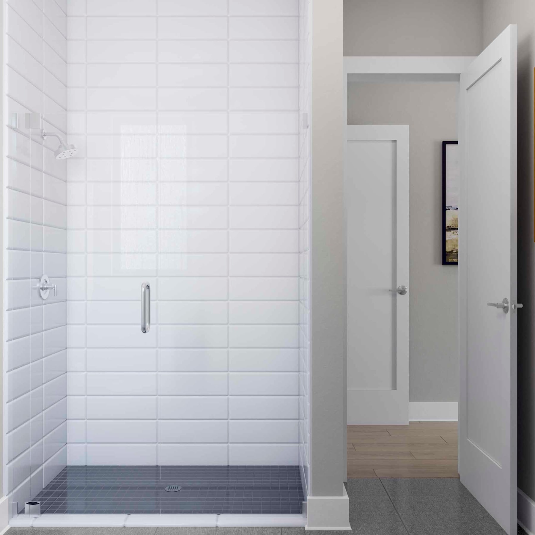 A modern, minimalist bathroom with a glass-enclosed shower, white subway tiles, and a wooden floor leading to an open doorway.