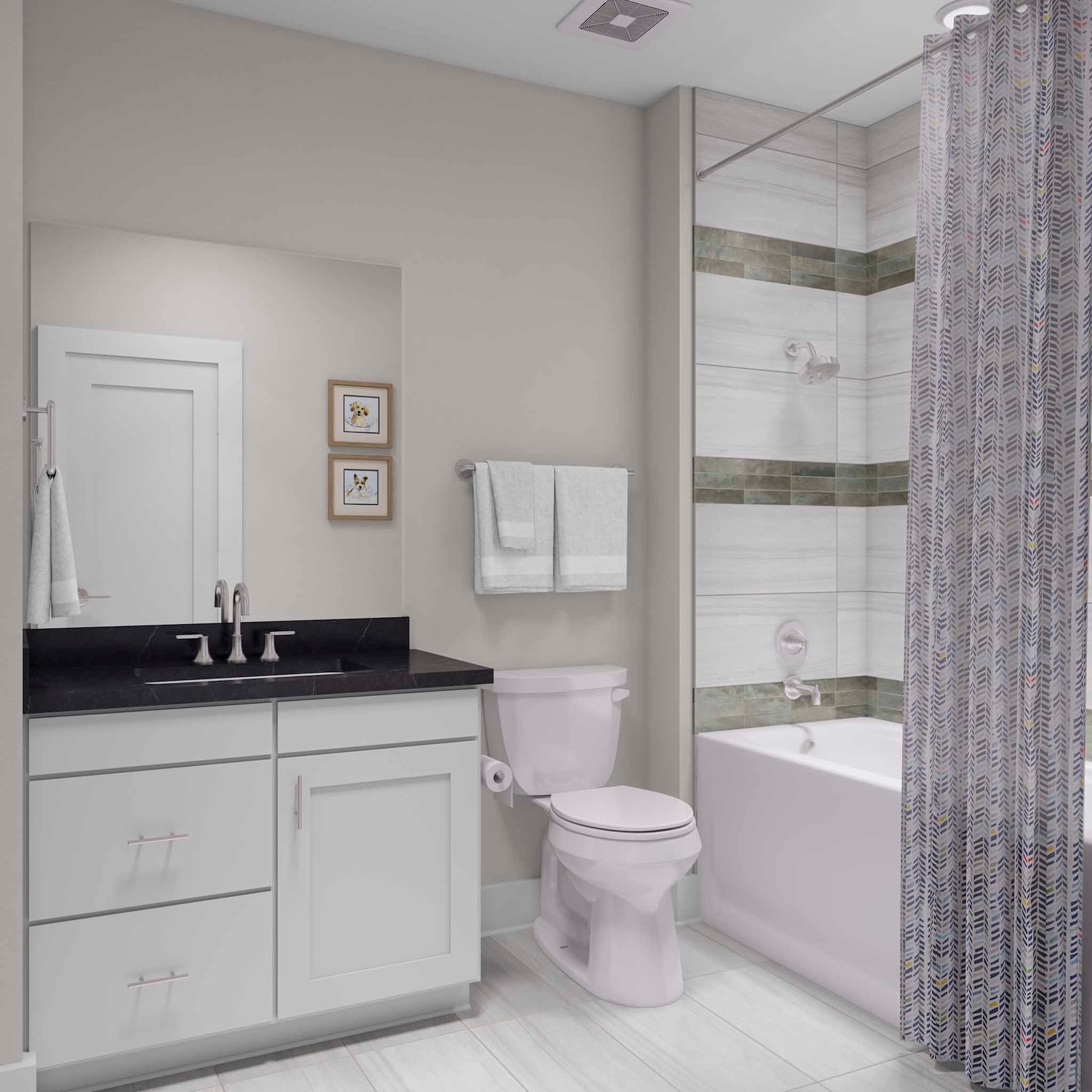 A modern and well-designed bathroom with a white vanity, black countertop, and a bathtub surrounded by patterned curtains.