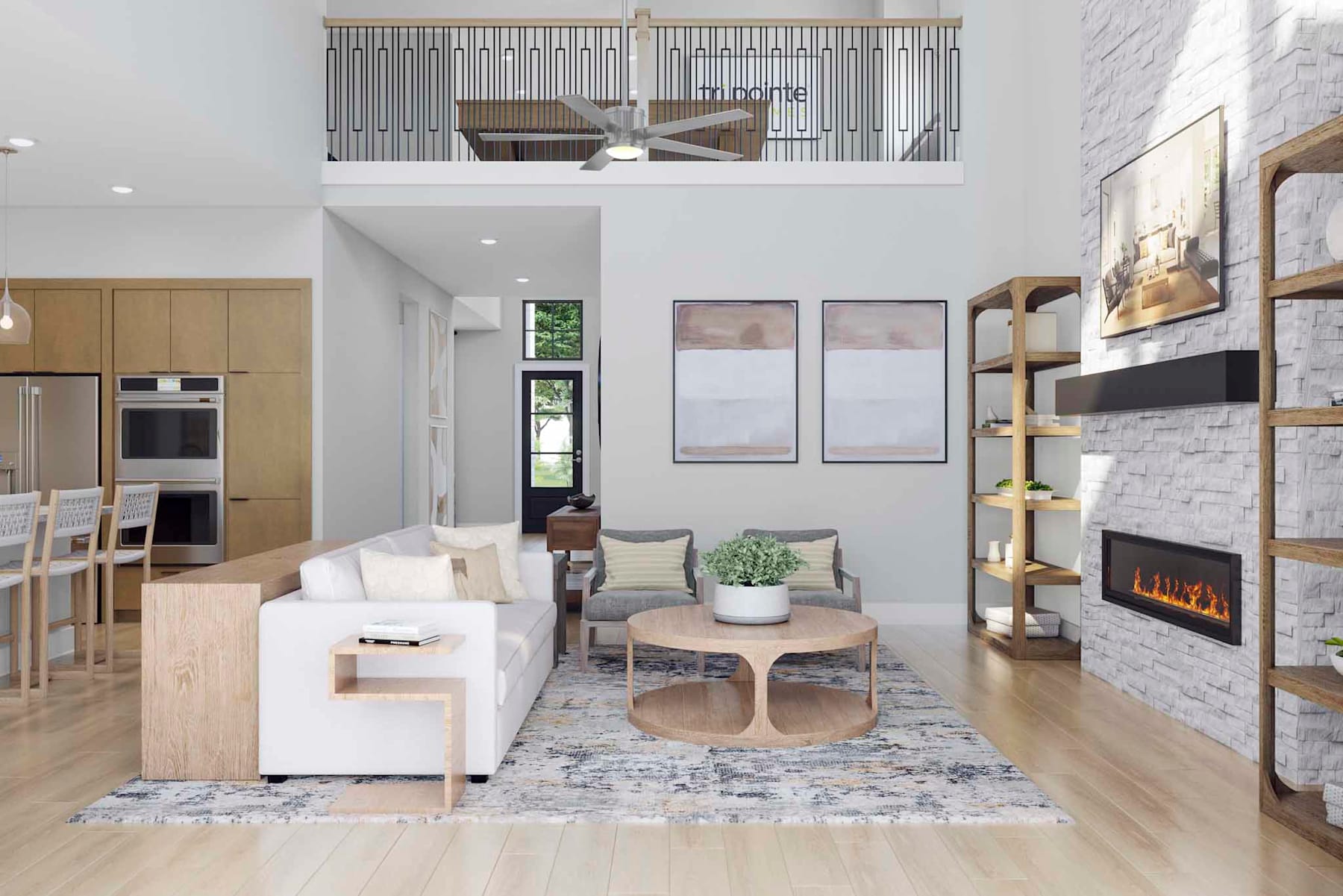 A modern and open-concept living room with a fireplace, comfortable seating, and a loft-style second floor visible above.