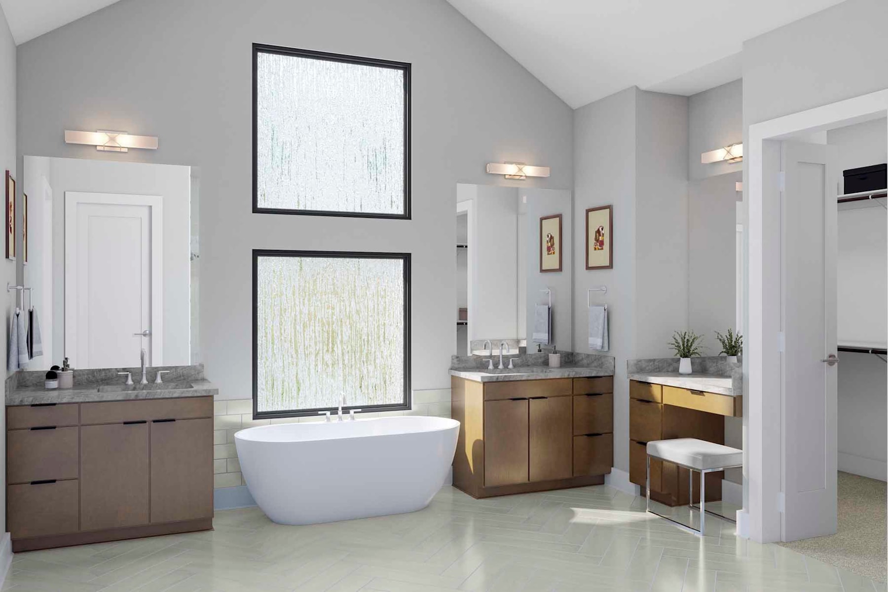 A modern and spacious bathroom with a freestanding bathtub, vanity cabinets, and large windows providing natural light.