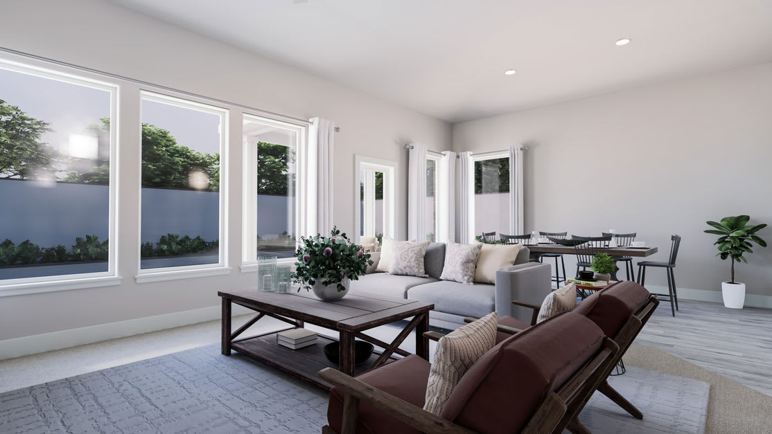 A modern and minimalist living room with large windows overlooking a lush outdoor landscape, featuring a wooden coffee table, comfortable sofas, and potted plants.