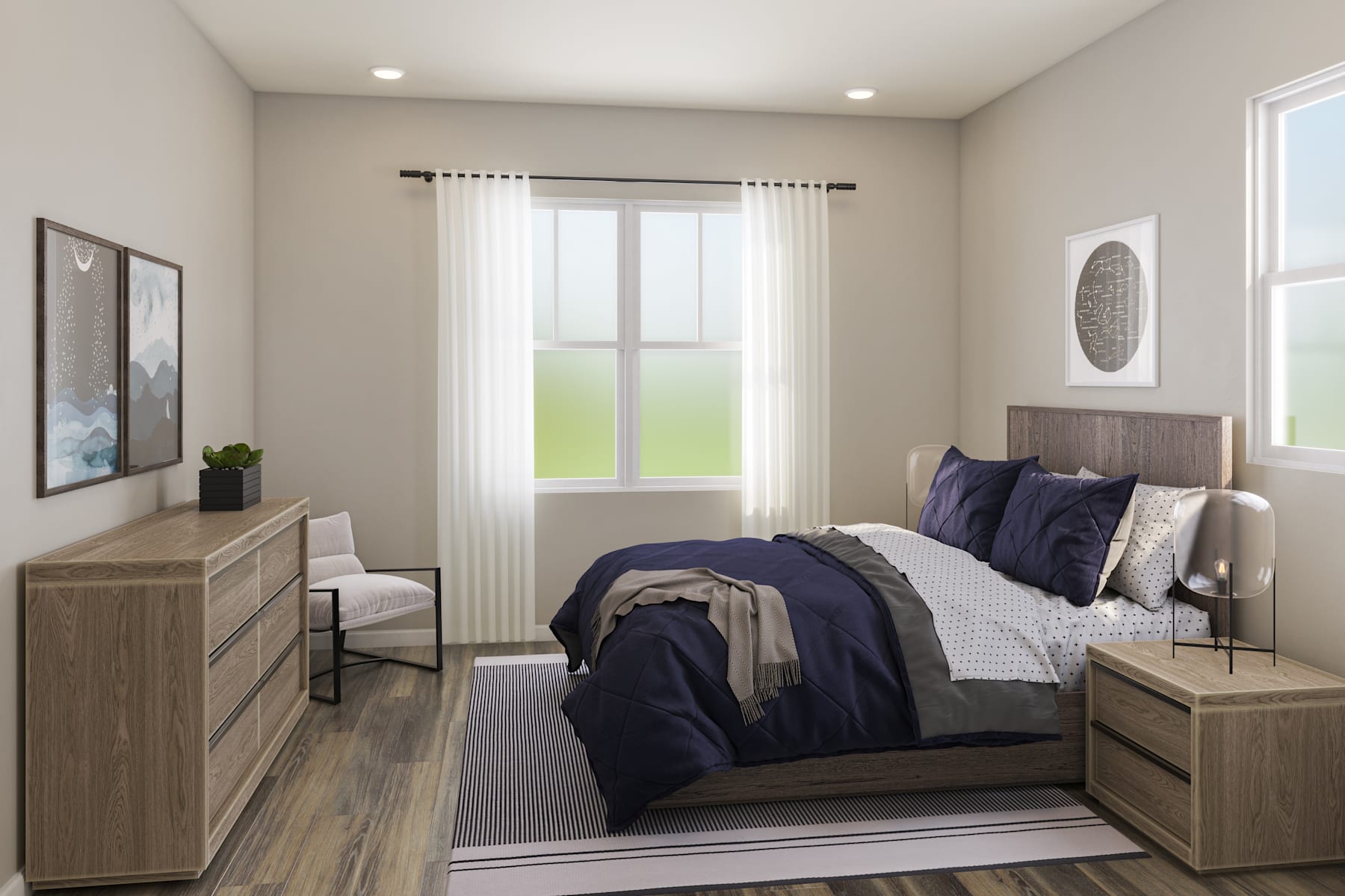 A cozy and well-furnished bedroom with a large window overlooking a grassy outdoor area, featuring a plush bed with navy blue bedding and wooden furniture pieces.