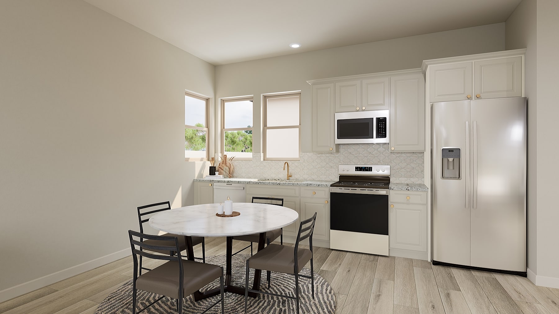 A modern, minimalist kitchen with white cabinets, a round dining table, and stainless steel appliances, set against a neutral-toned wall and hardwood flooring.