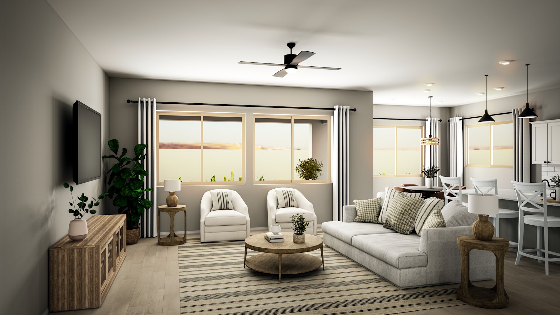 A cozy and inviting living room with a white sofa, wooden coffee table, and a ceiling fan, overlooking a scenic outdoor view through large windows.