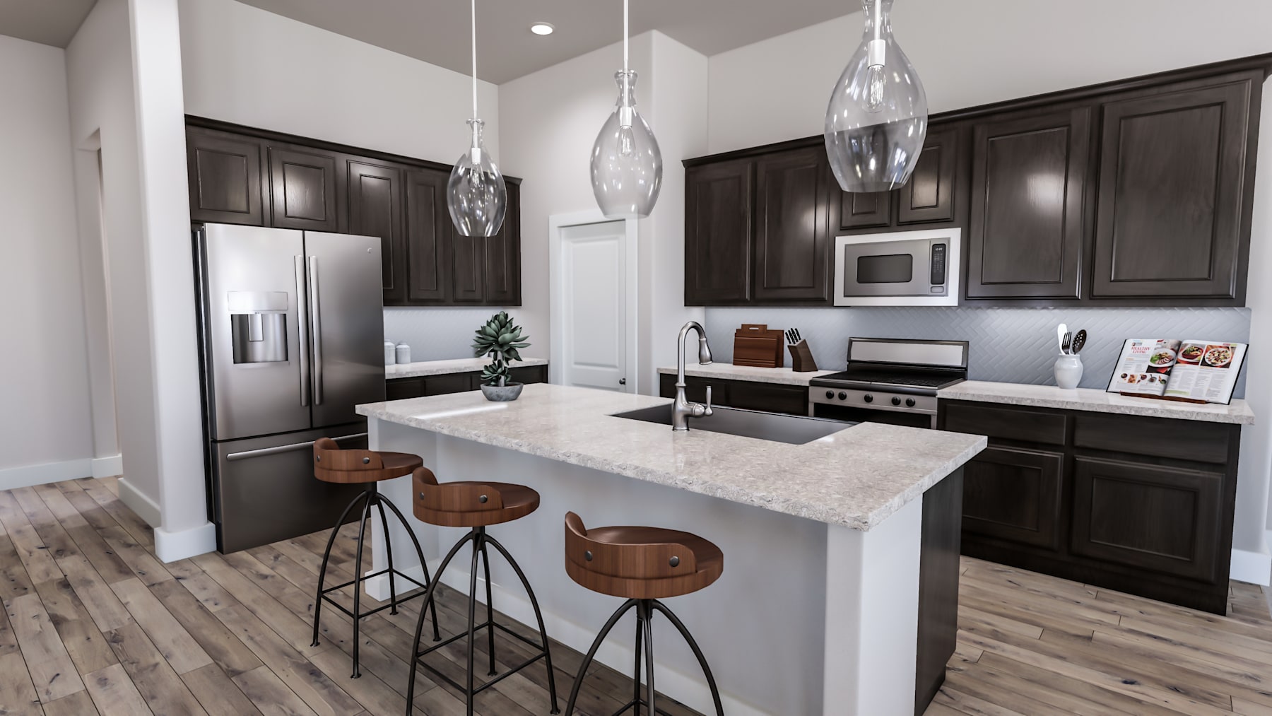 A modern and stylish kitchen with dark cabinets, a white countertop, and pendant lights hanging above the island, creating a warm and inviting atmosphere.