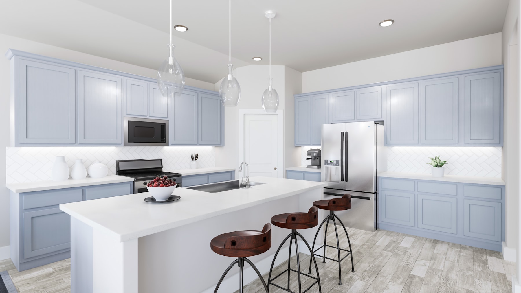 A modern, minimalist kitchen with light blue cabinets, a white countertop, and pendant lights hanging above a central island with bar stools.