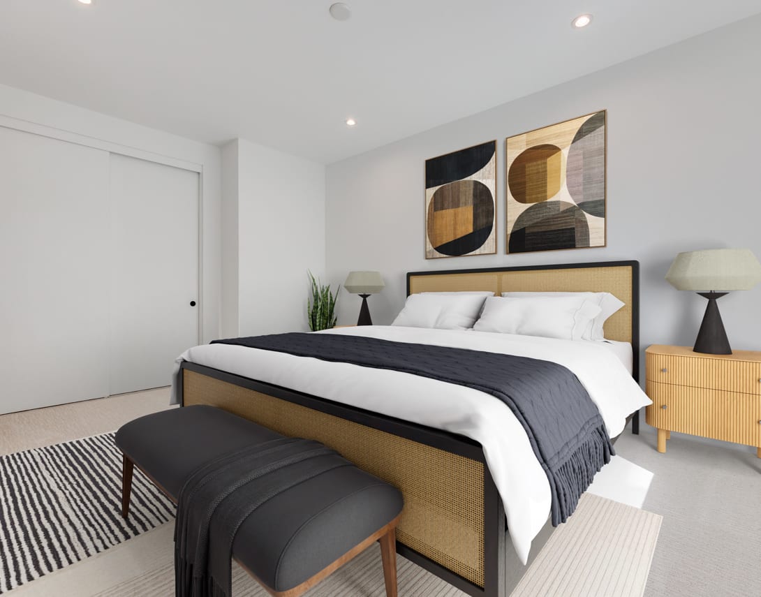 A modern and minimalist bedroom with a large bed, abstract artwork on the wall, and a striped rug in the foreground.
