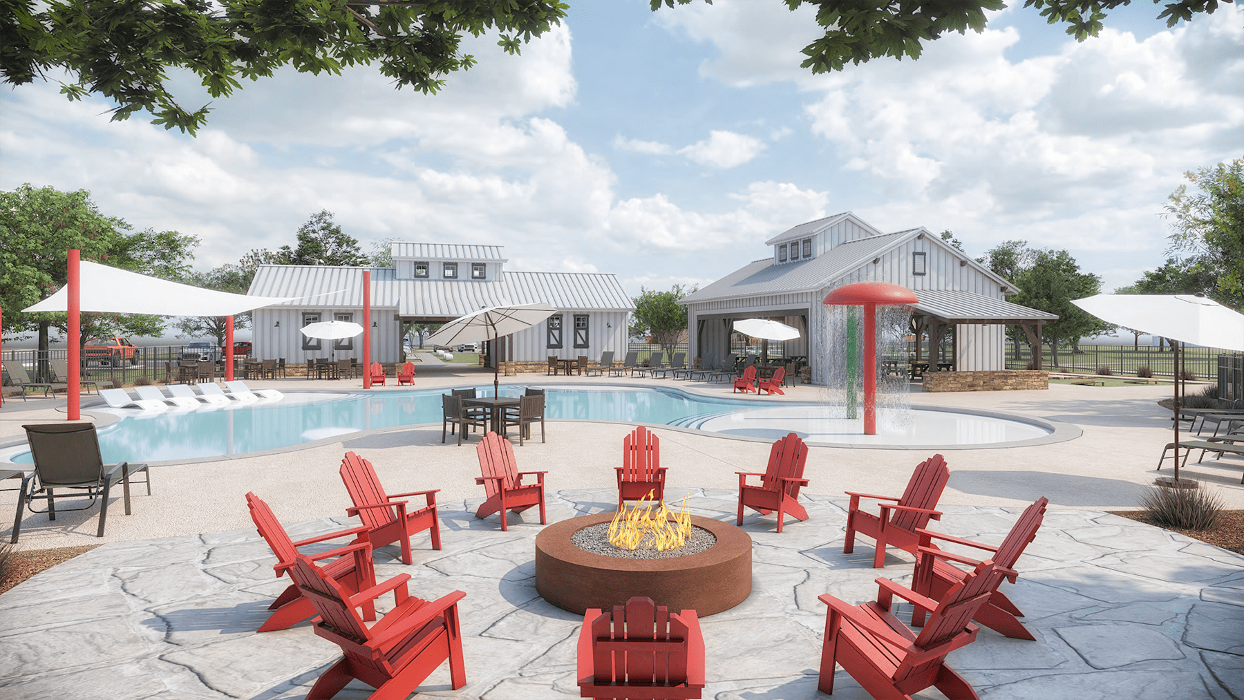 A cozy outdoor seating area with a fire pit surrounded by red Adirondack chairs, overlooking a swimming pool and a rustic-style building in the background.