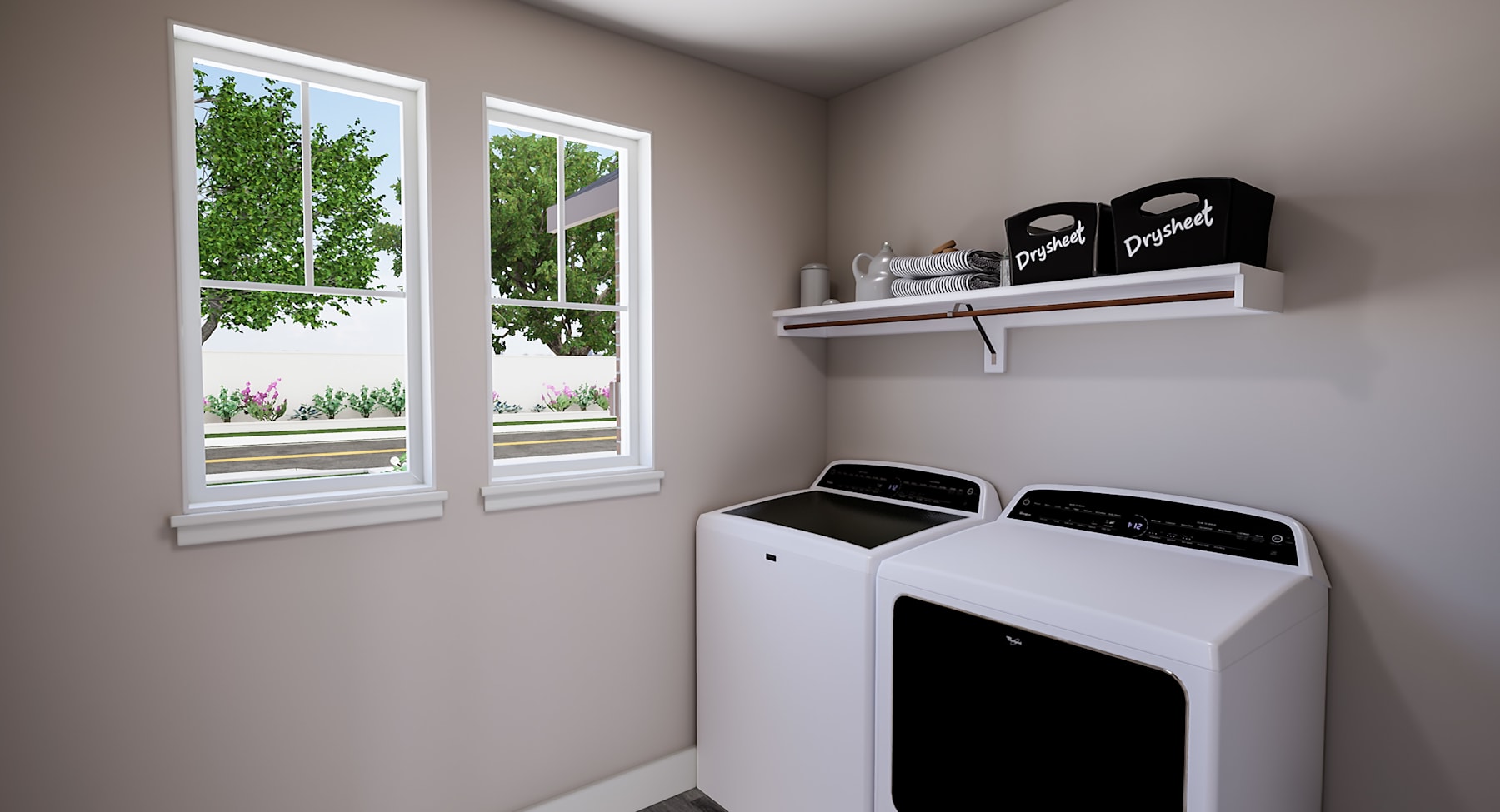 A modern and minimalist laundry room with a white washing machine and dryer, shelves displaying decorative items, and large windows overlooking a lush outdoor landscape.