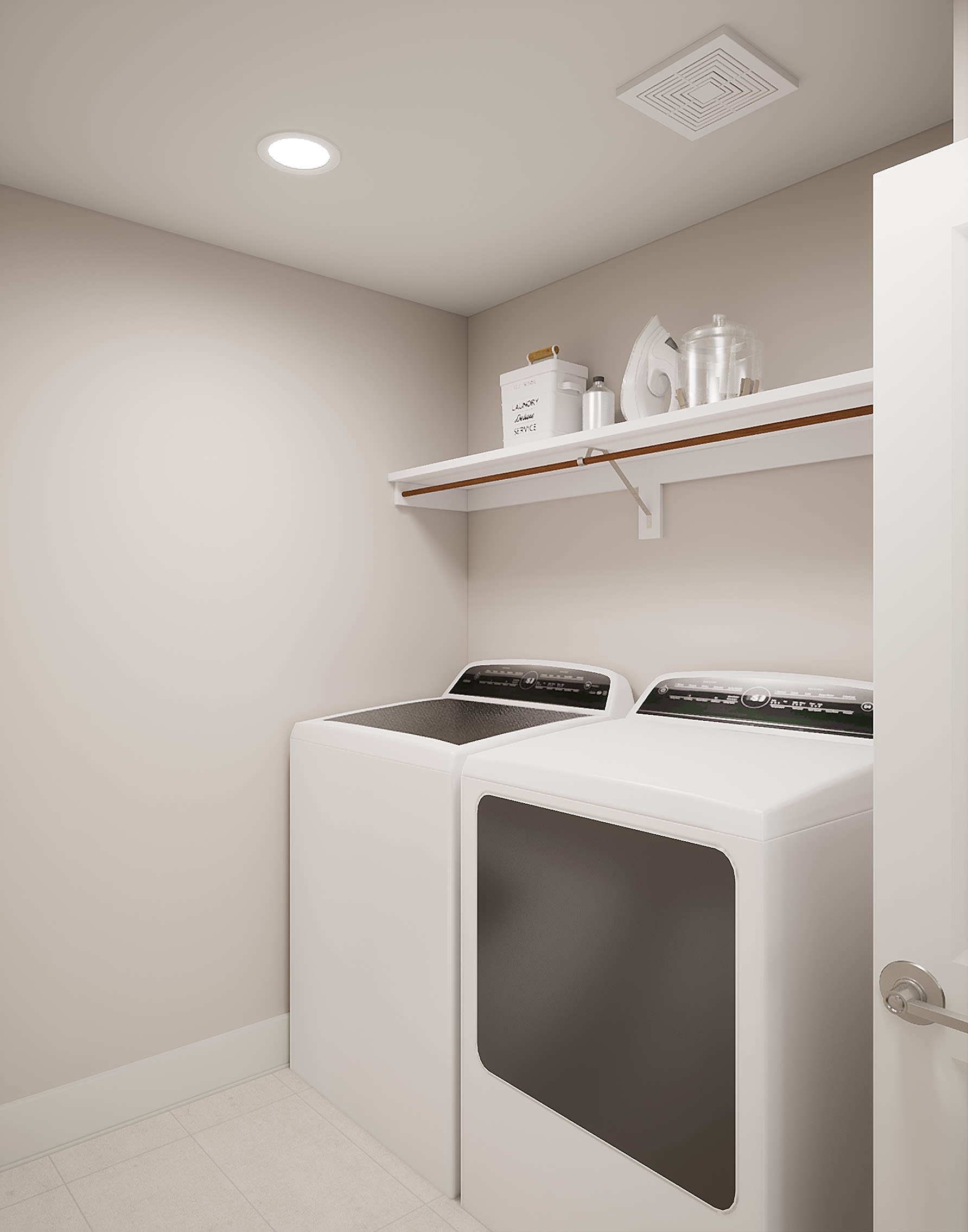 A modern and minimalist laundry room with a washing machine and dryer, along with shelves displaying various household items.