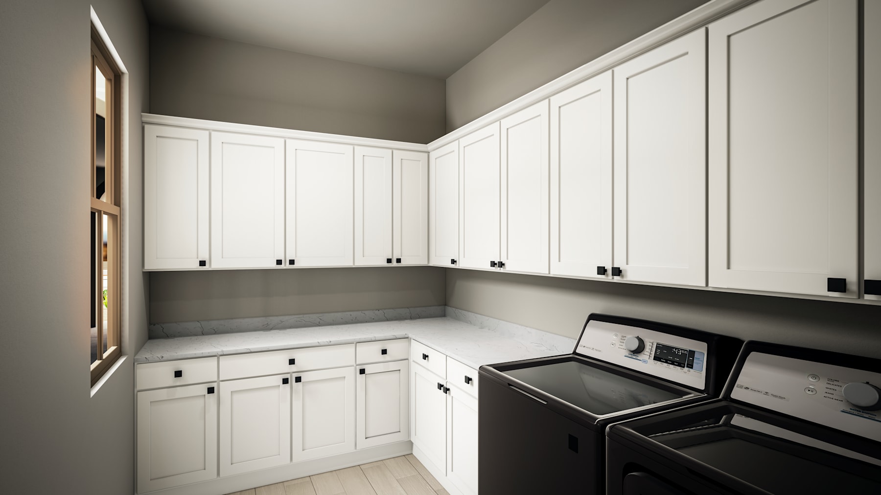 A well-organized and modern-looking kitchen with white cabinets, a stove, and other appliances in a neutral-toned room.
