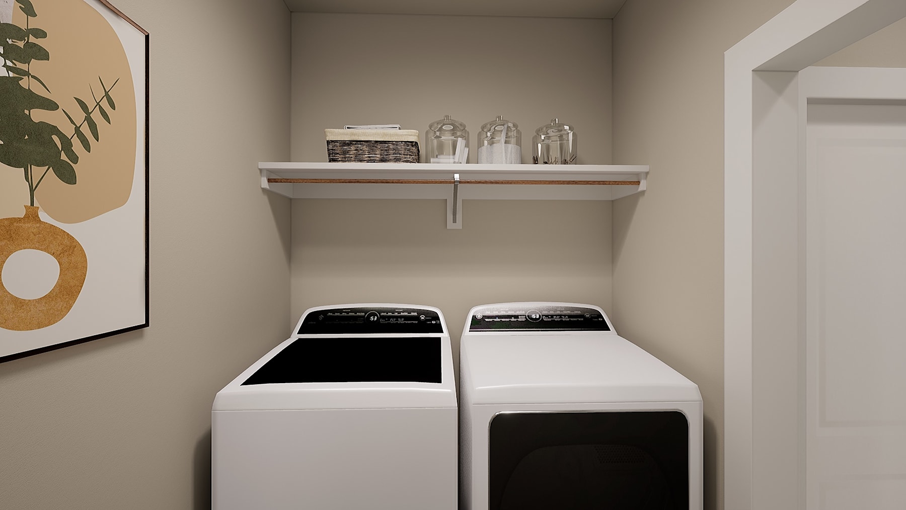 A modern laundry room with white washing machines and shelves displaying decorative items.