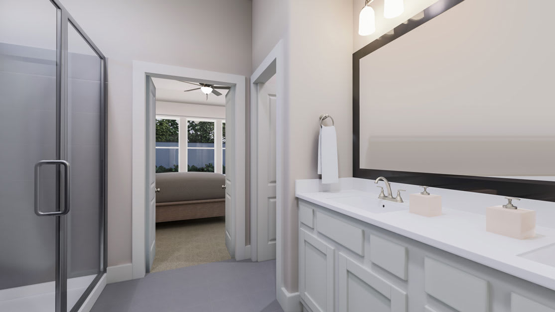 A modern and minimalist bathroom with a white vanity, a large mirror, and a view of an adjacent bedroom through an open doorway.