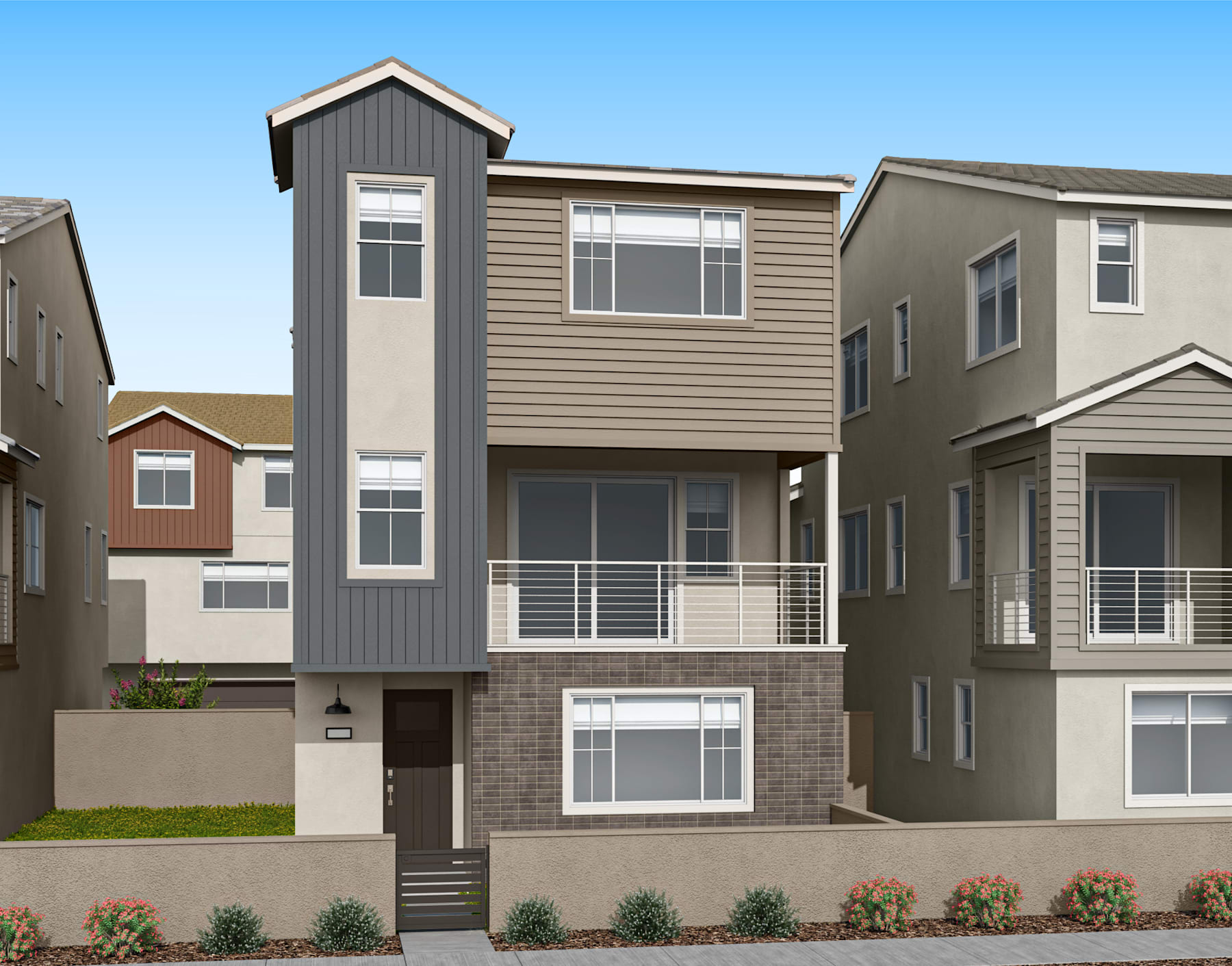 A multi-story residential building with a gray exterior and a tall, narrow tower-like structure on the left side, surrounded by landscaping and other similar buildings in the background.