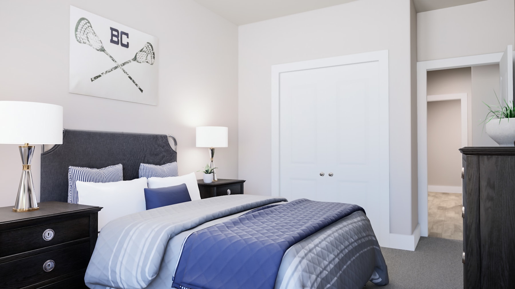 A modern and minimalist bedroom with a gray and blue quilted bedspread, a black wooden dresser, and a framed artwork on the wall.
