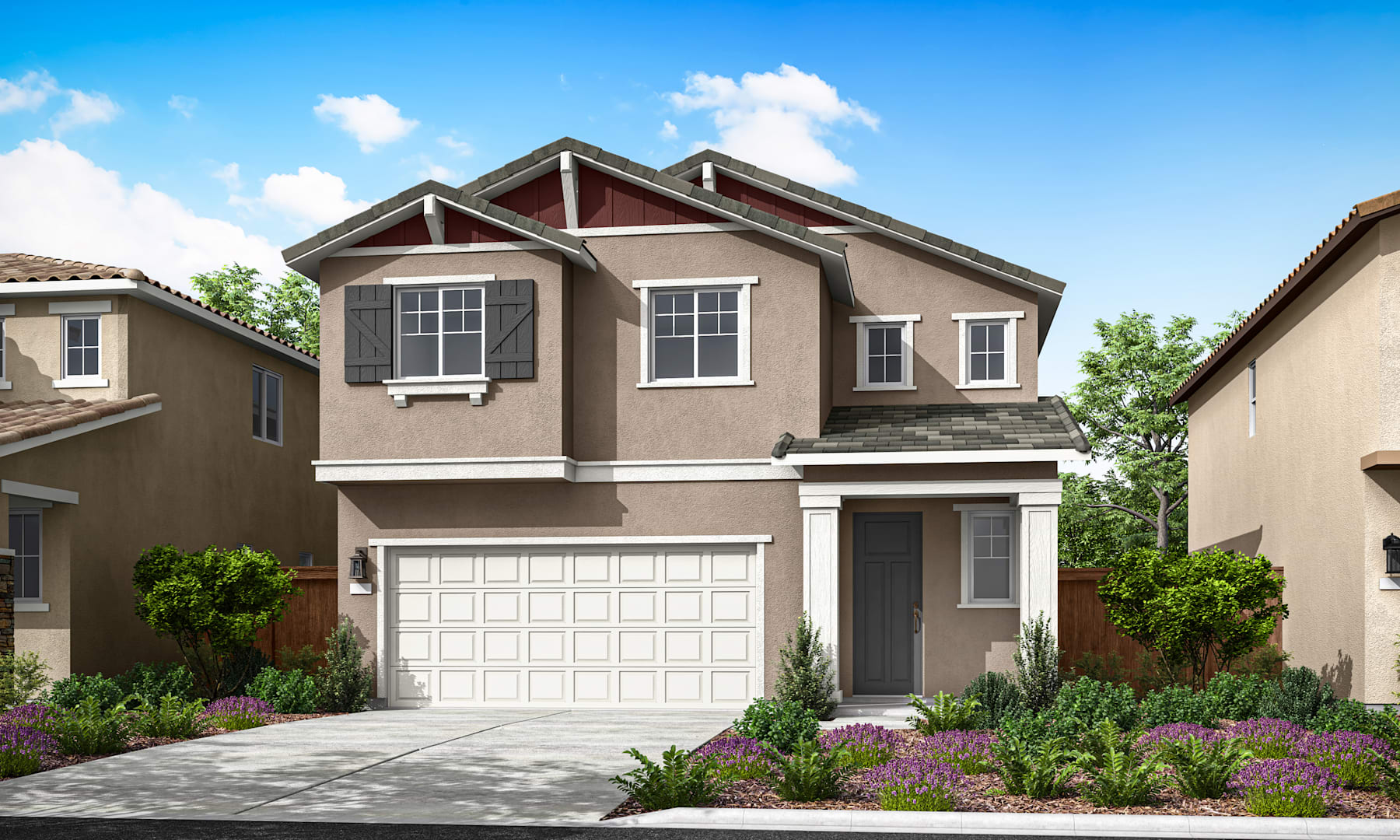A two-story residential house with a garage, surrounded by lush greenery and a paved driveway, set against a clear blue sky with fluffy white clouds.