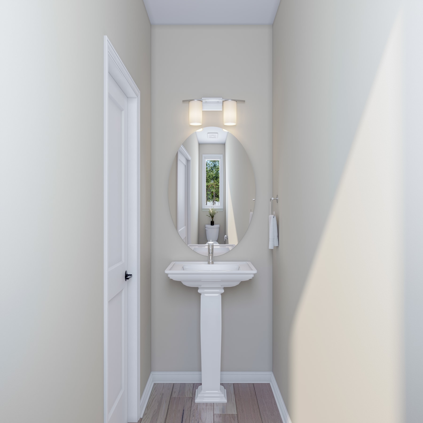 A bright and airy bathroom with a pedestal sink, a mirror, and a window overlooking greenery outside.