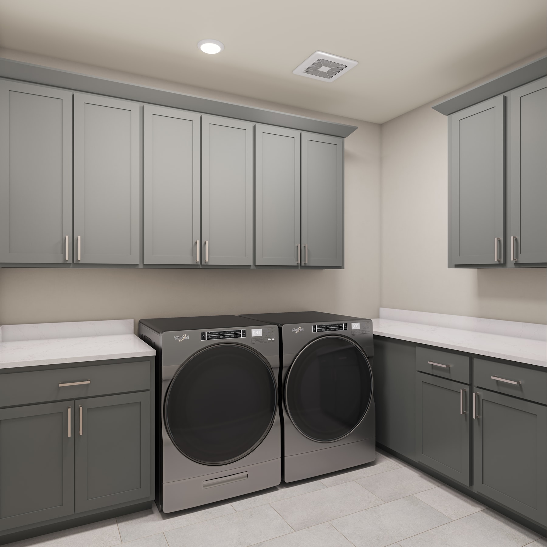 A modern and well-organized laundry room with gray cabinets, a washer and dryer, and a tiled floor.