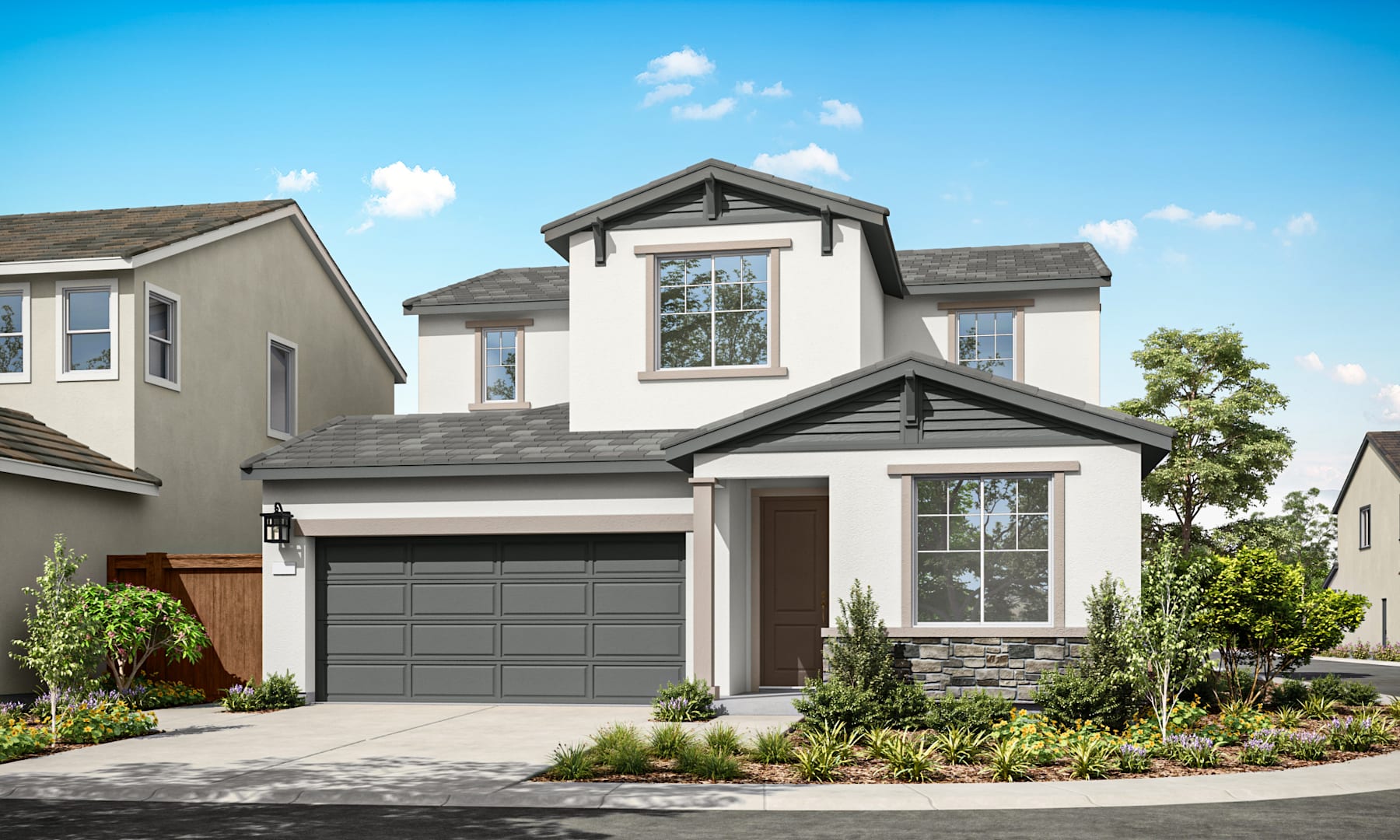 A two-story residential house with a garage, surrounded by landscaped greenery and a clear blue sky with fluffy white clouds.