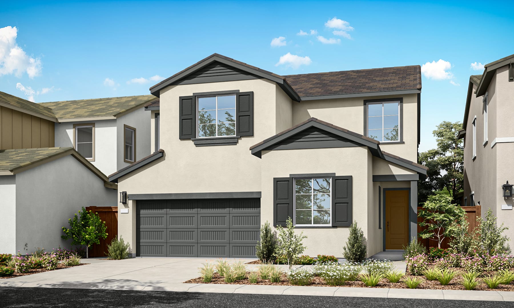 A two-story residential house with a garage, surrounded by landscaped gardens and a clear blue sky with fluffy clouds.