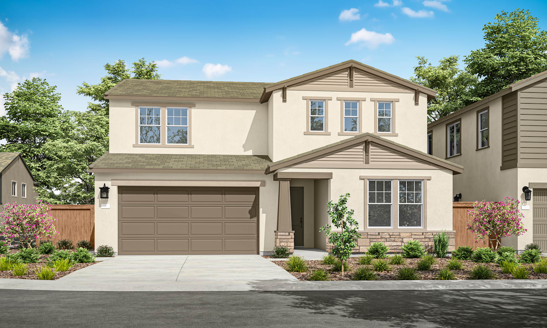A two-story residential house with a garage, surrounded by lush greenery and a paved driveway in the foreground.