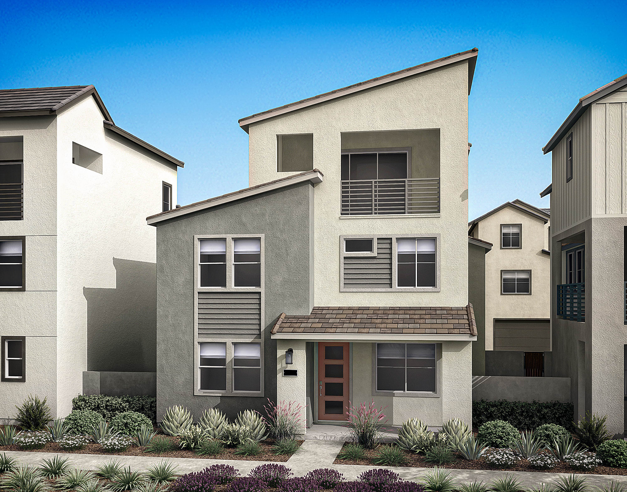 A modern, multi-story residential building with a neutral color scheme and various architectural features, surrounded by landscaped gardens and a clear blue sky in the background.