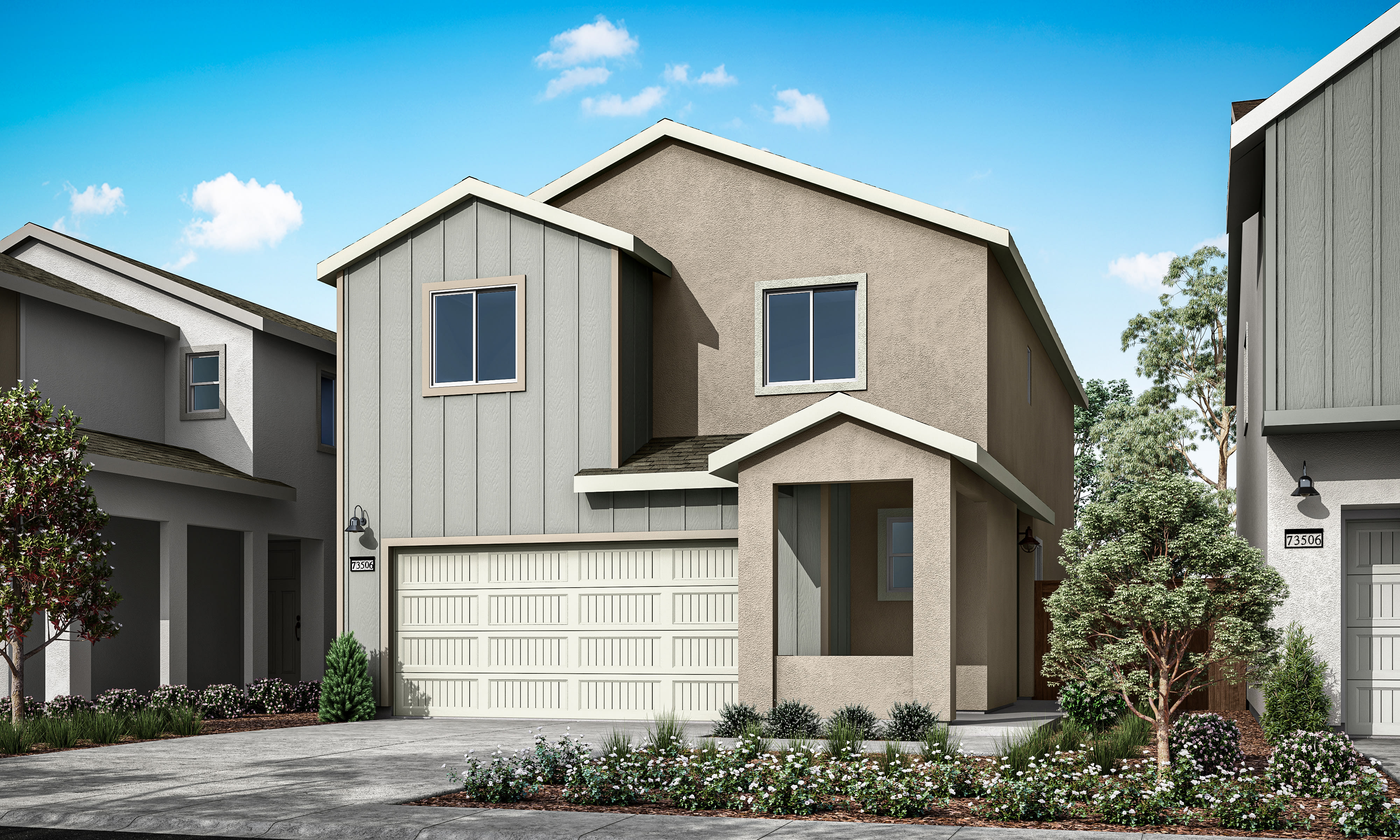 A modern two-story residential building with a garage door and landscaped front yard, set against a clear blue sky with scattered clouds.