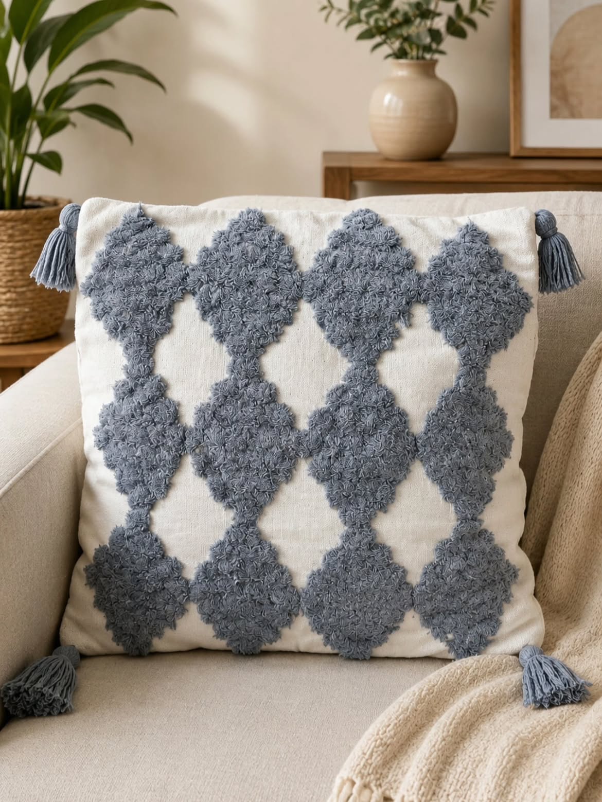 Cushion cover with fresh fibre insert after refilling at a Nairobi workshop